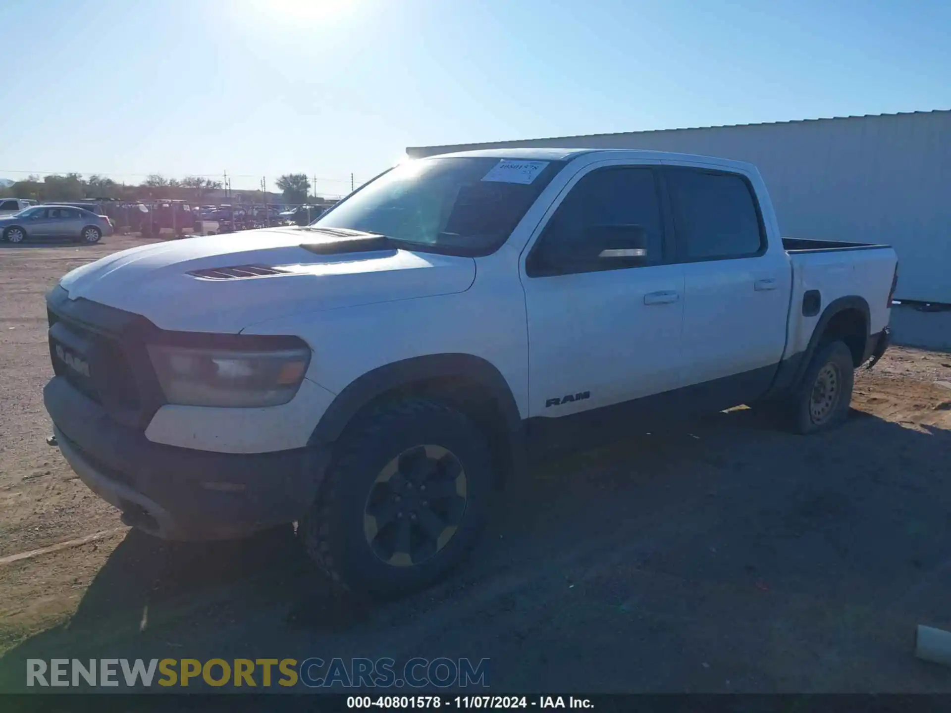 2 Photograph of a damaged car 1C6SRFLT7LN374823 RAM 1500 2020