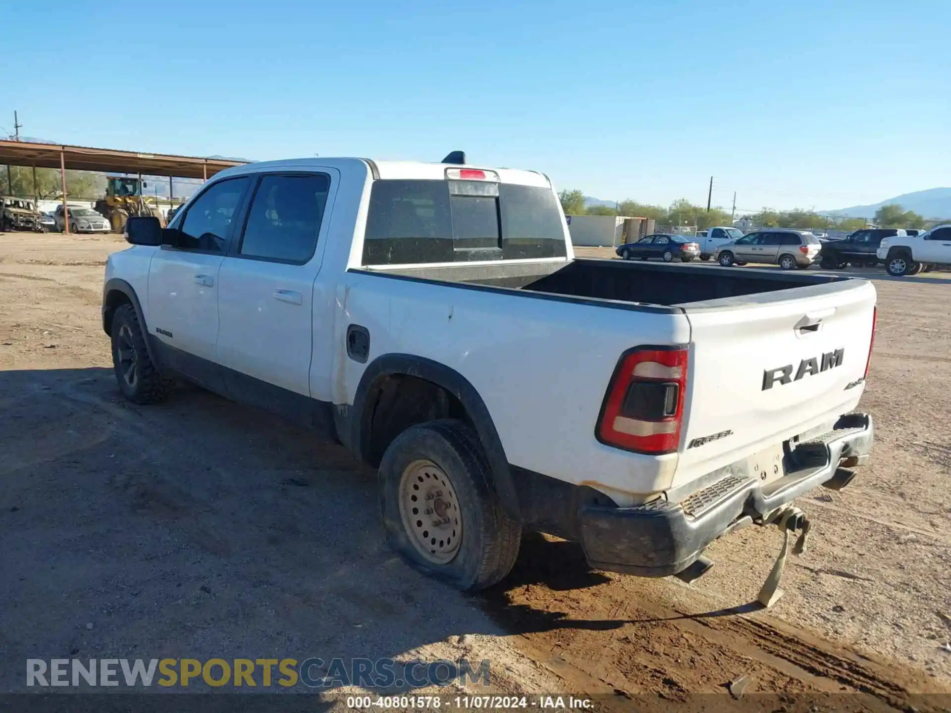 3 Photograph of a damaged car 1C6SRFLT7LN374823 RAM 1500 2020