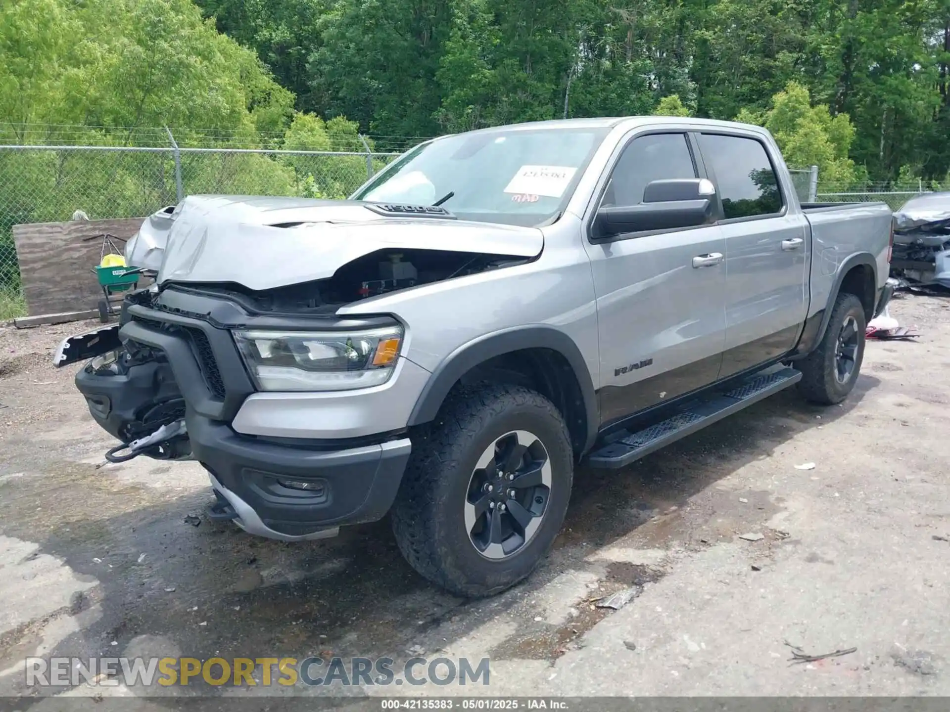 2 Photograph of a damaged car 1C6SRFLT8LN229872 RAM 1500 2020