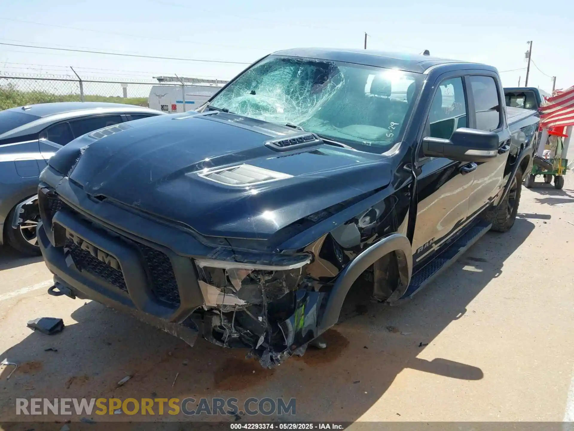 2 Photograph of a damaged car 1C6SRFLT8LN377312 RAM 1500 2020