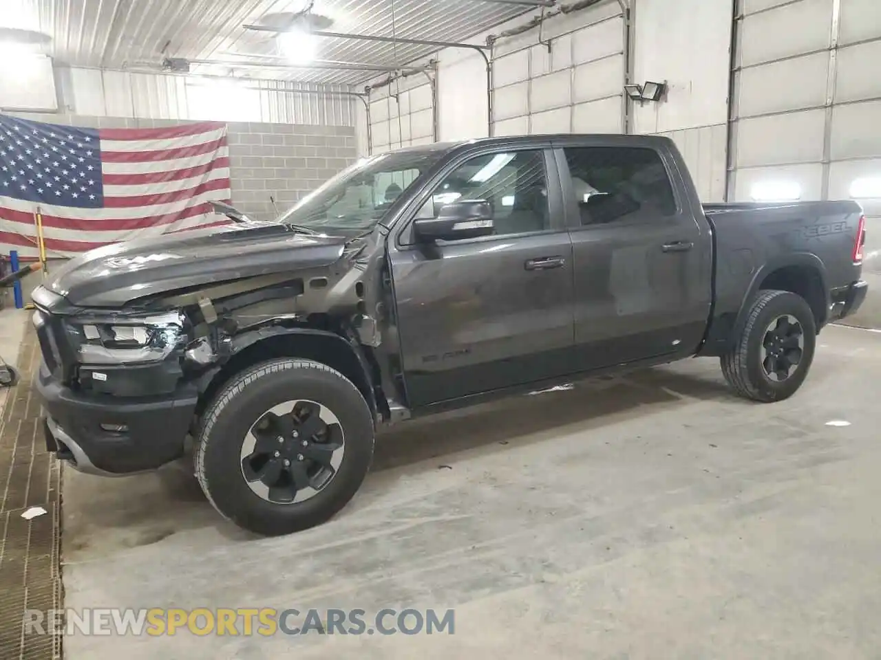 1 Photograph of a damaged car 1C6SRFLTXLN131457 RAM 1500 2020