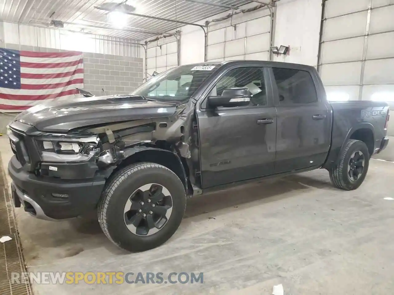 2 Photograph of a damaged car 1C6SRFLTXLN131457 RAM 1500 2020