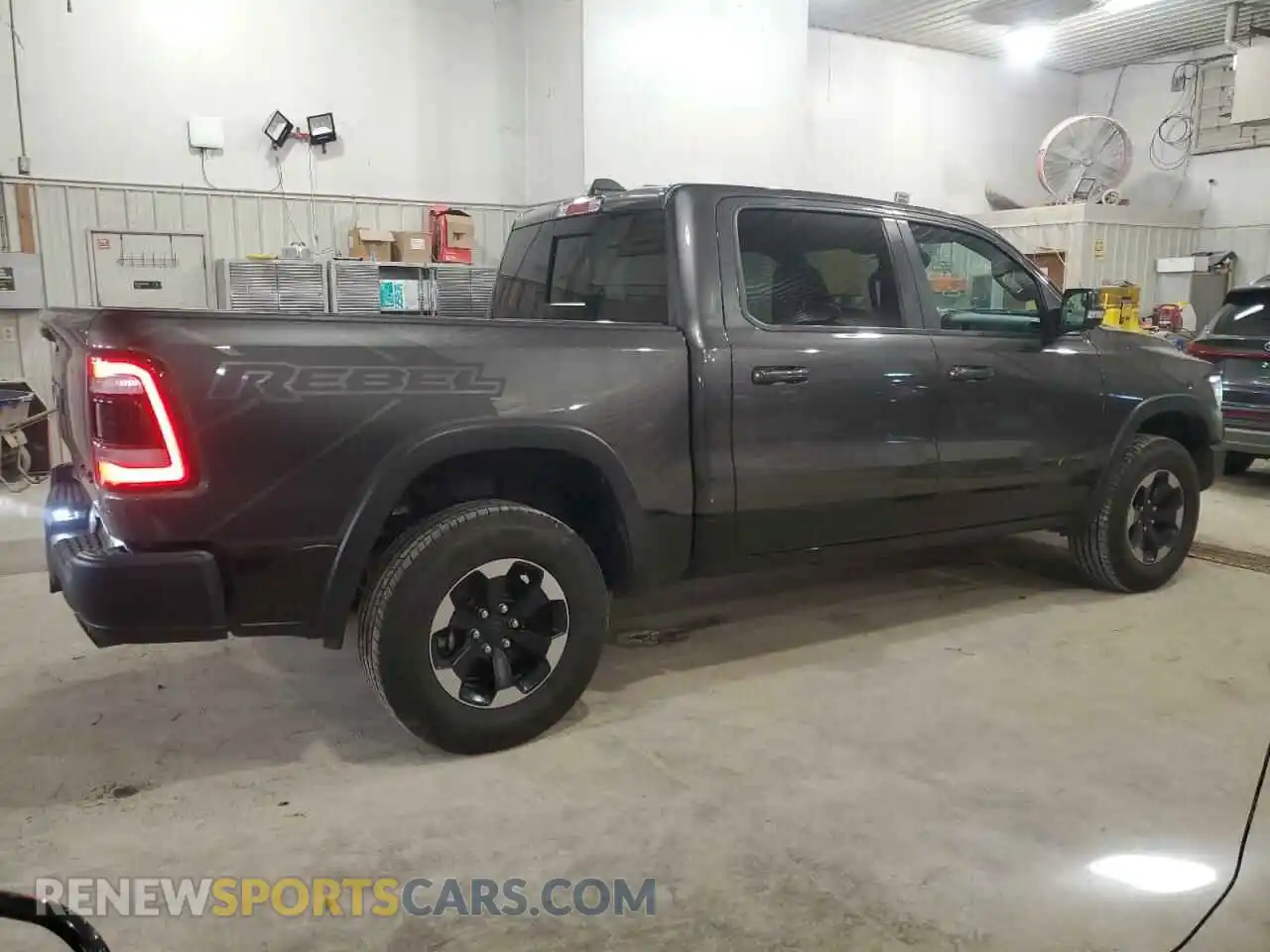 3 Photograph of a damaged car 1C6SRFLTXLN131457 RAM 1500 2020
