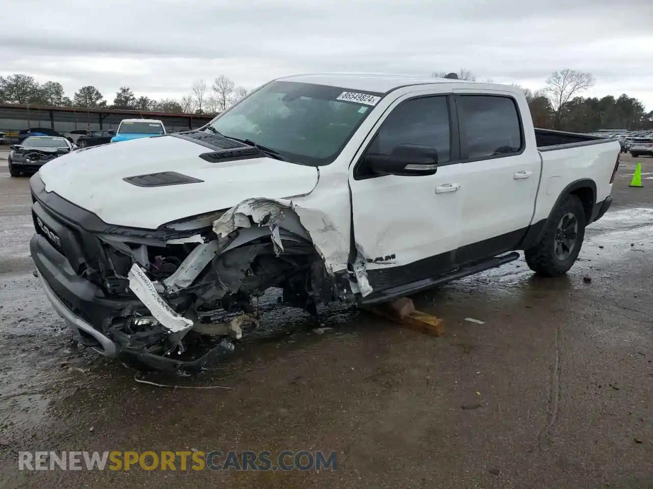 1 Photograph of a damaged car 1C6SRFLTXLN234362 RAM 1500 2020