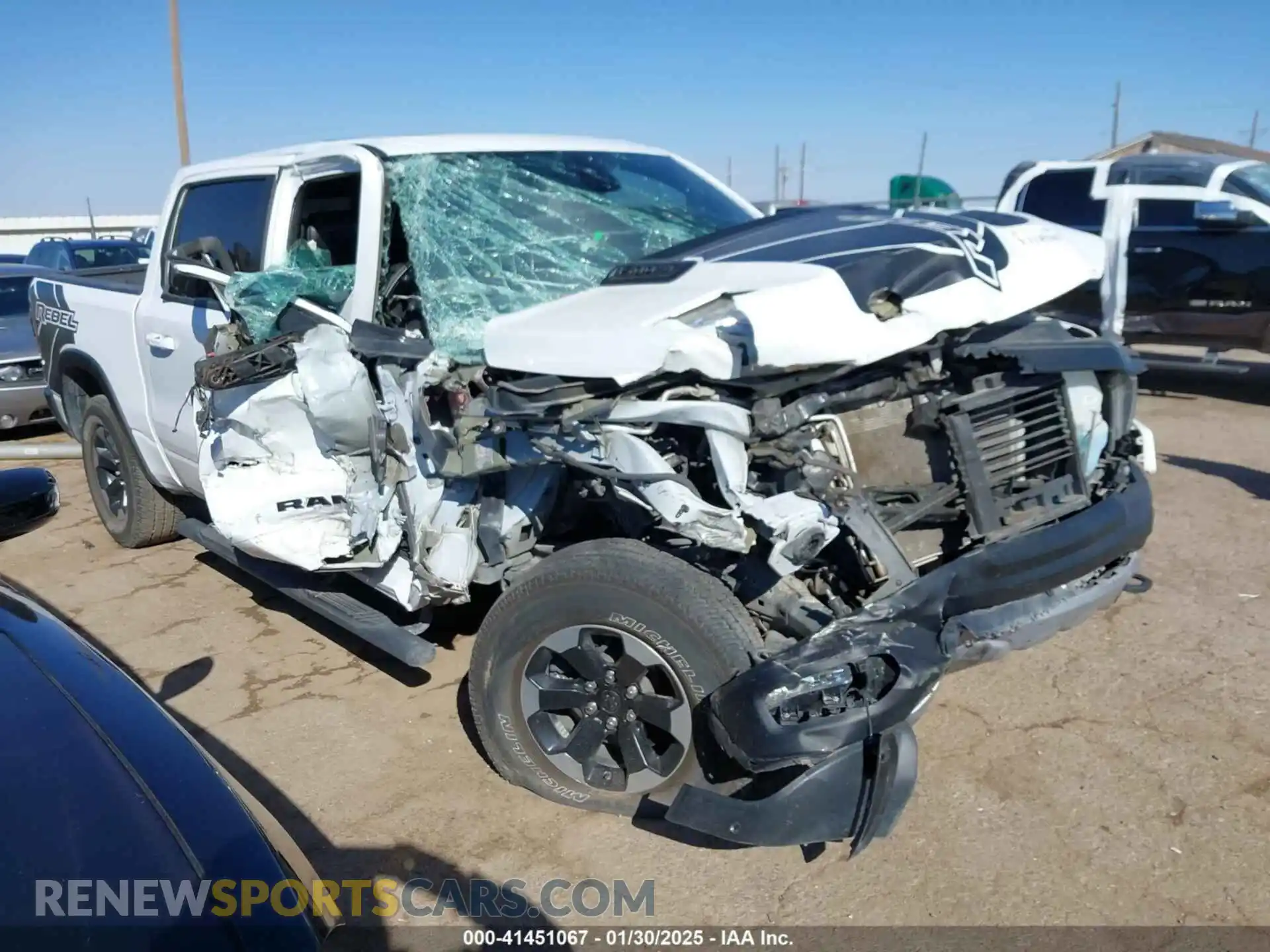 1 Photograph of a damaged car 1C6SRFLTXLN305656 RAM 1500 2020