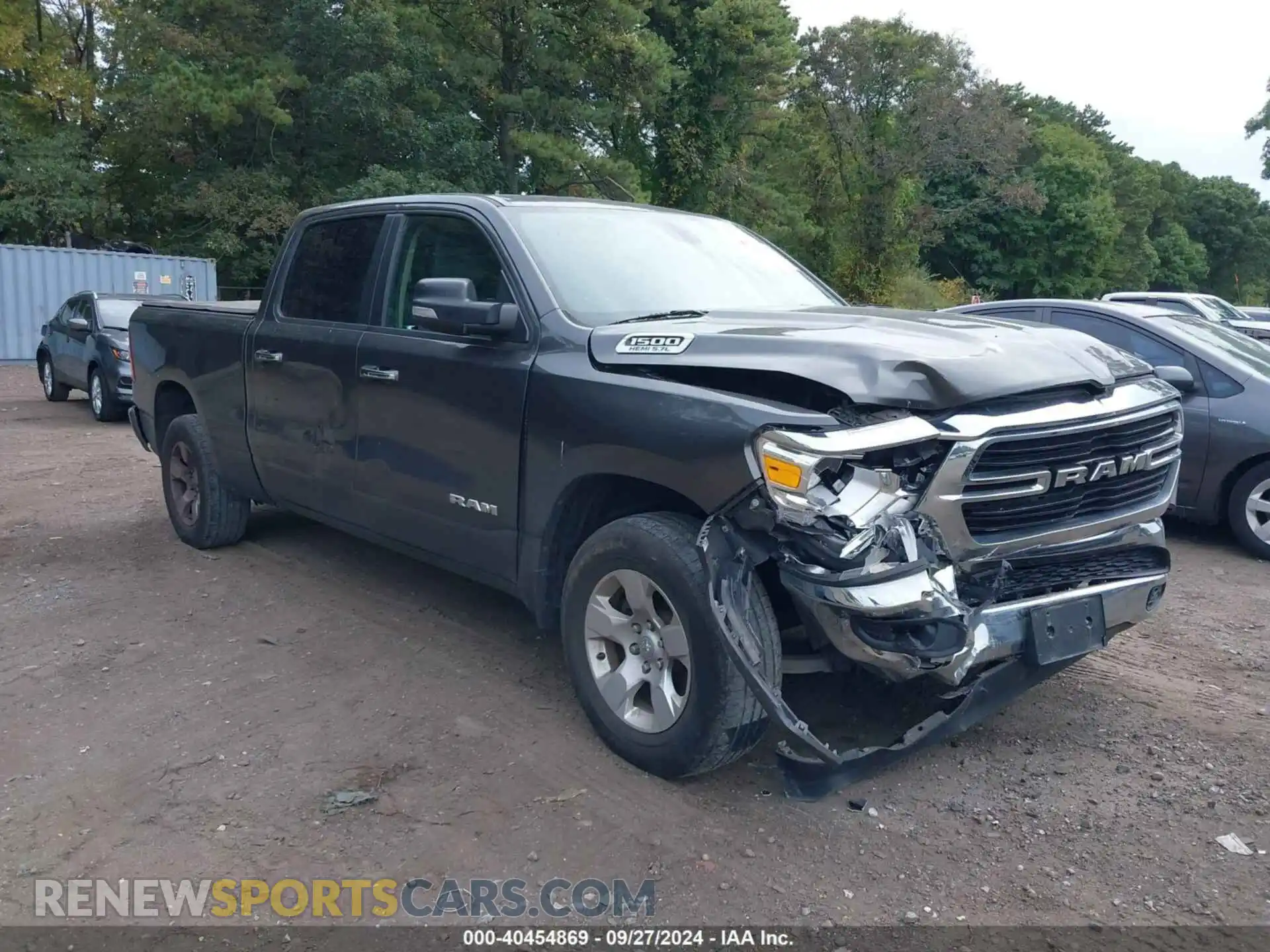 1 Photograph of a damaged car 1C6SRFMT3LN143125 RAM 1500 2020