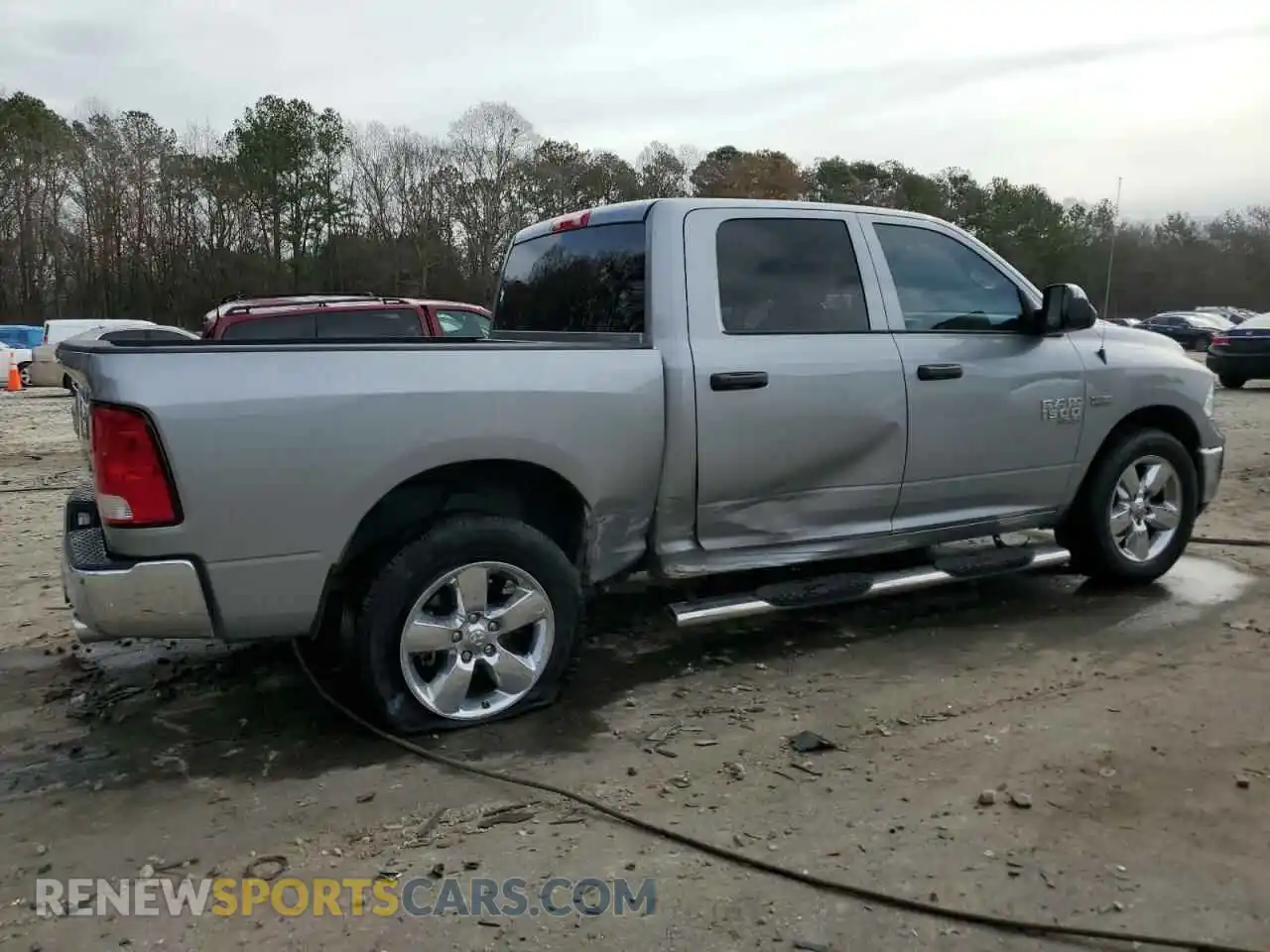 3 Photograph of a damaged car 3C6RR7KT4LG290716 RAM 1500 2020