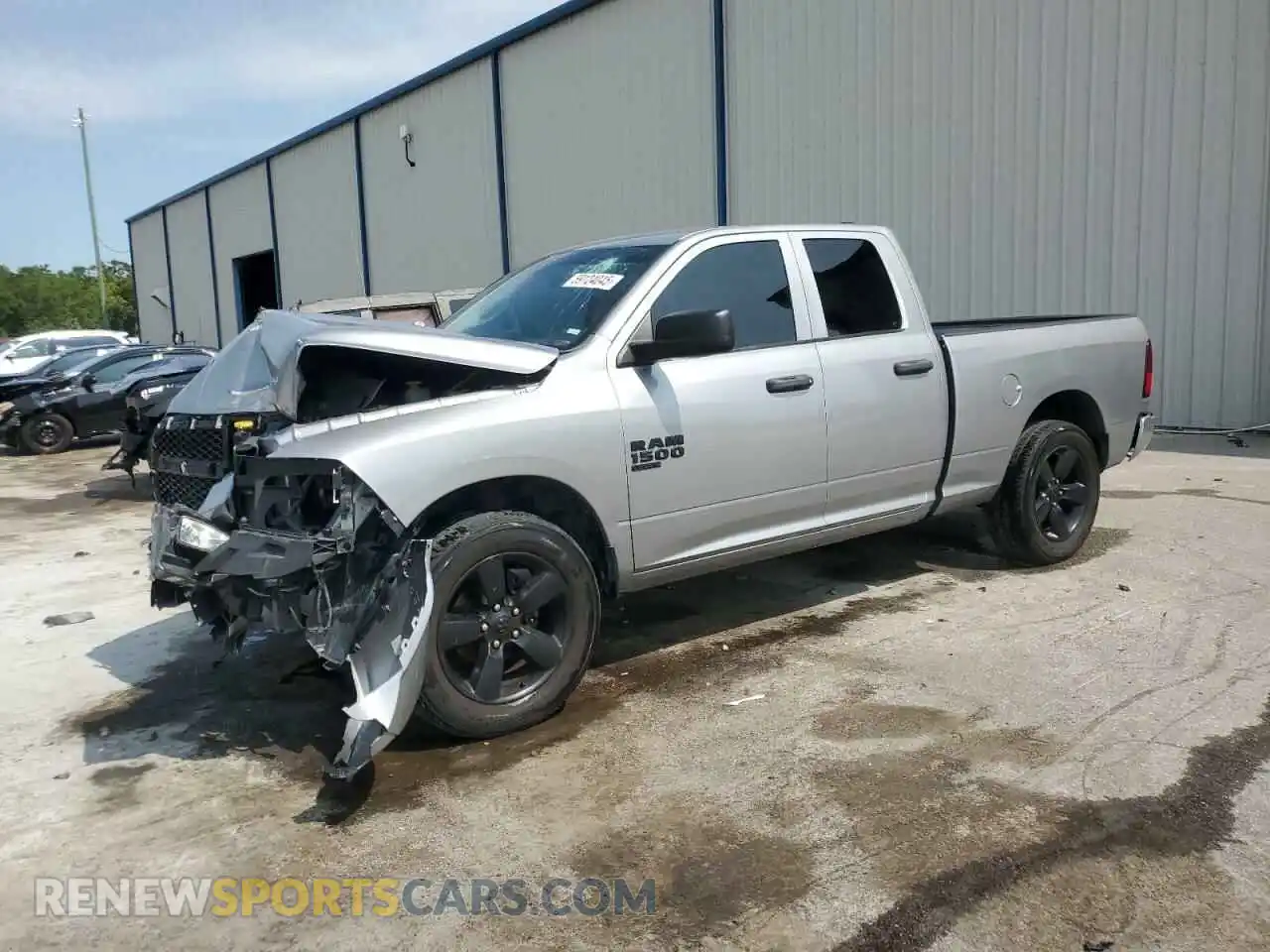 1 Photograph of a damaged car 1C6RR6FG0MS520978 RAM 1500 2021
