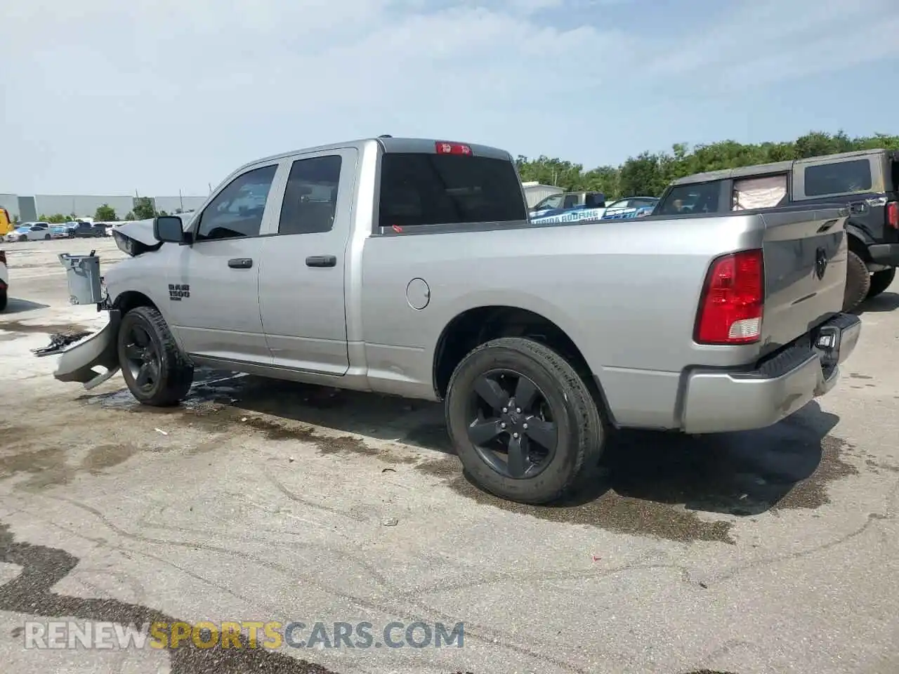 2 Photograph of a damaged car 1C6RR6FG0MS520978 RAM 1500 2021