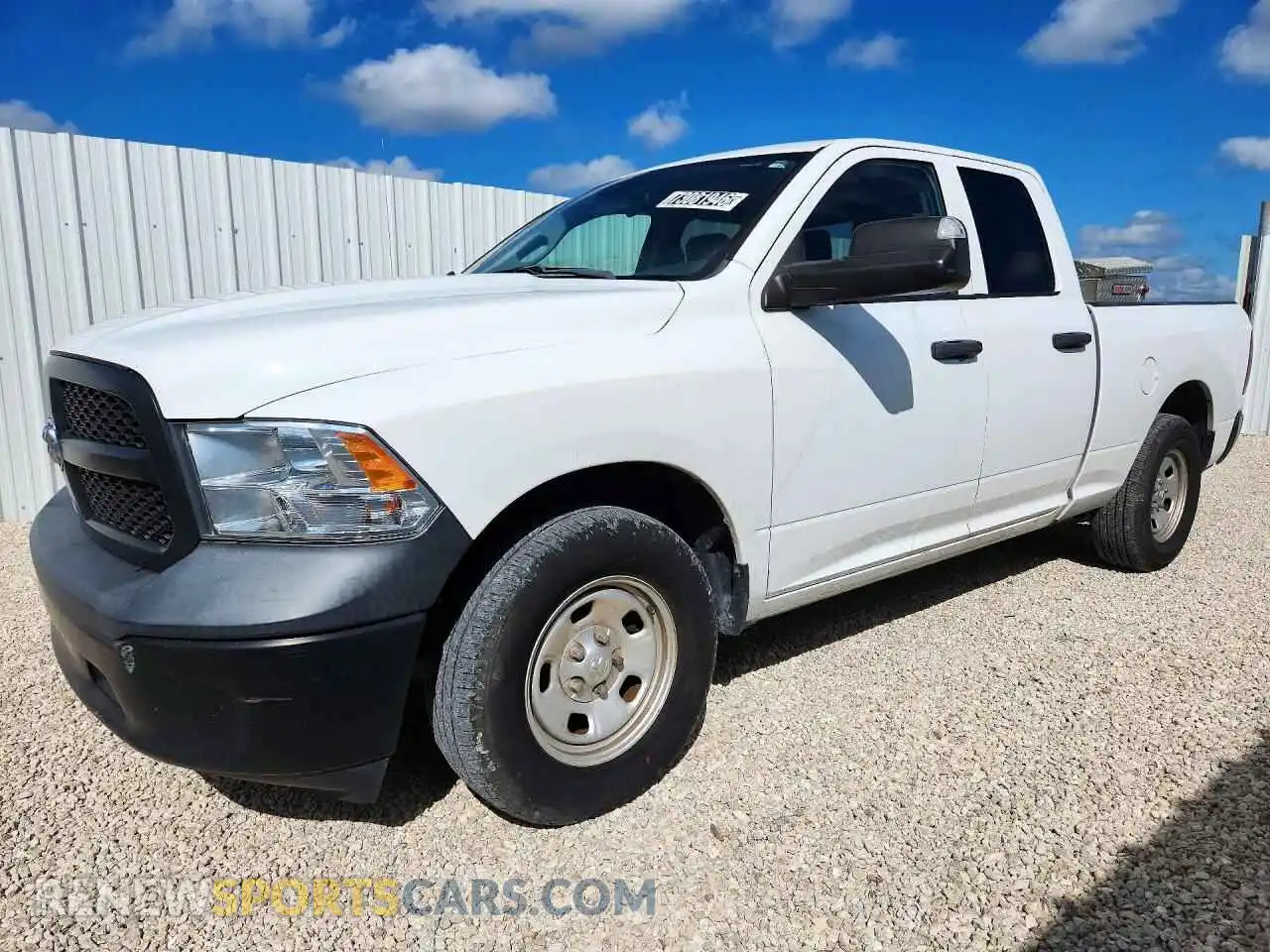 1 Photograph of a damaged car 1C6RR6FG1MS593843 RAM 1500 2021