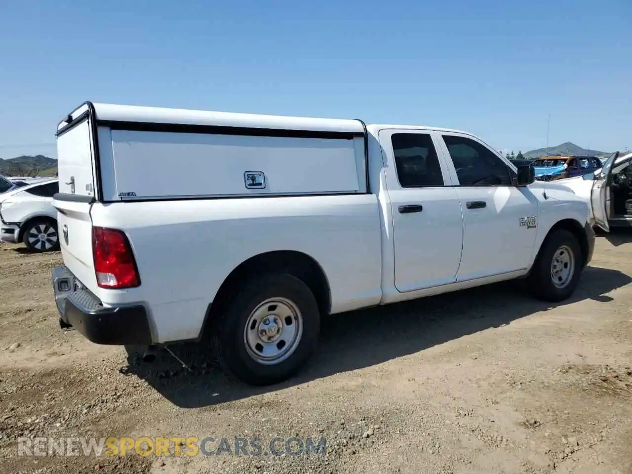 3 Photograph of a damaged car 1C6RR6FG9MS512815 RAM 1500 2021