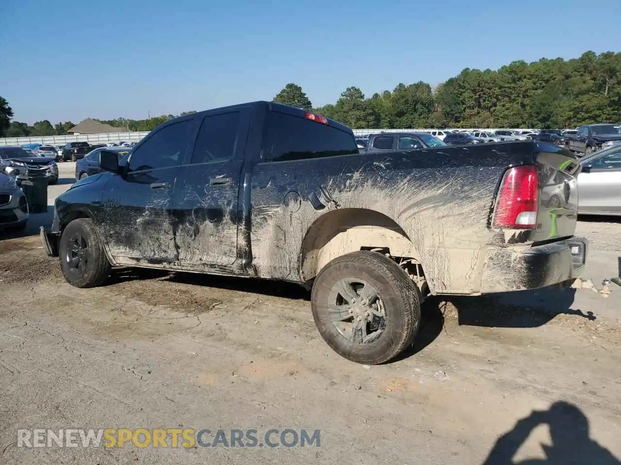 2 Photograph of a damaged car 1C6RR6FG9MS578460 RAM 1500 2021