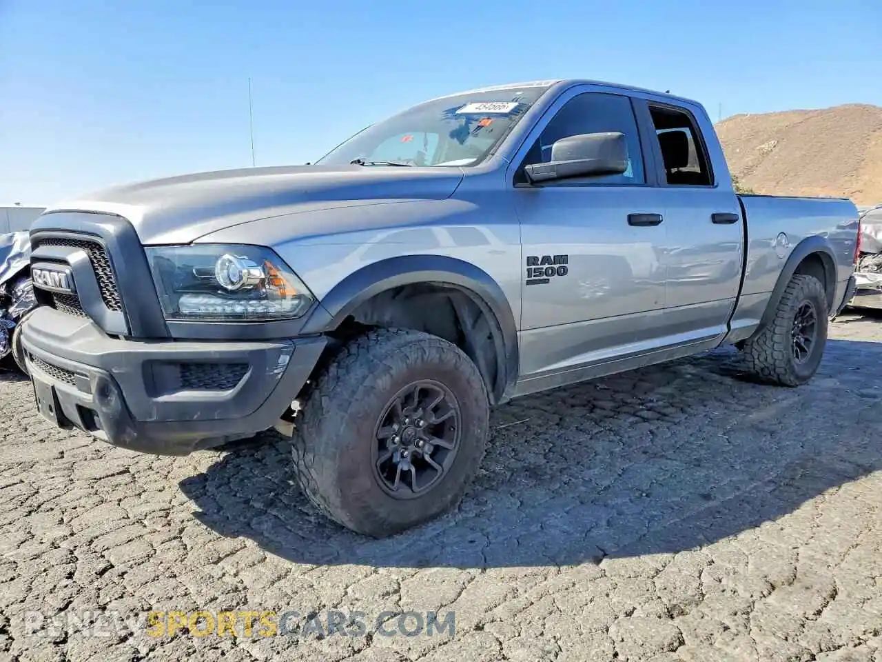 1 Photograph of a damaged car 1C6RR6GG1MS594098 RAM 1500 2021