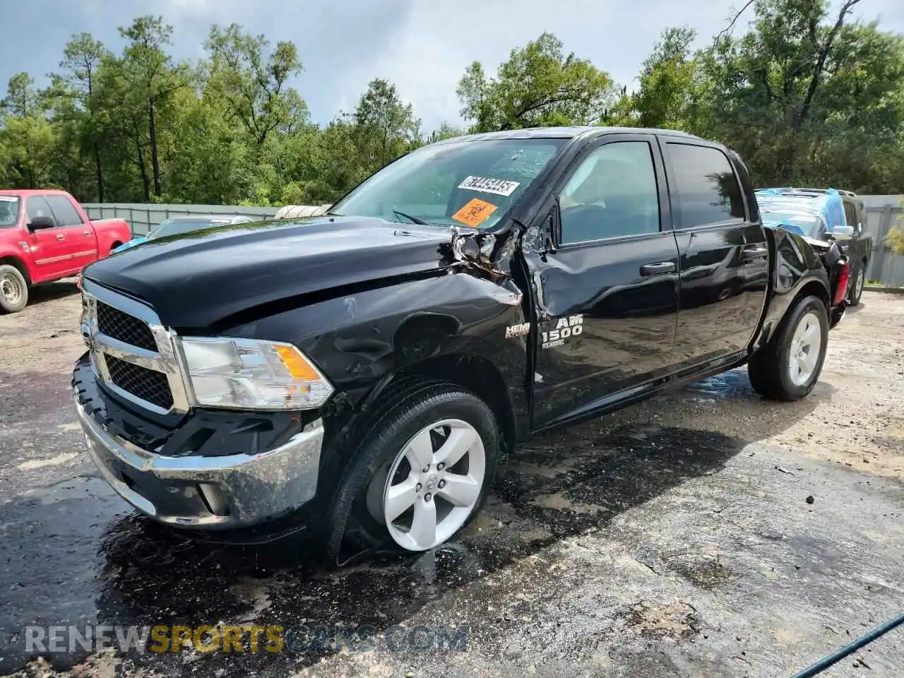 1 Photograph of a damaged car 1C6RR6KT7MS592411 RAM 1500 2021