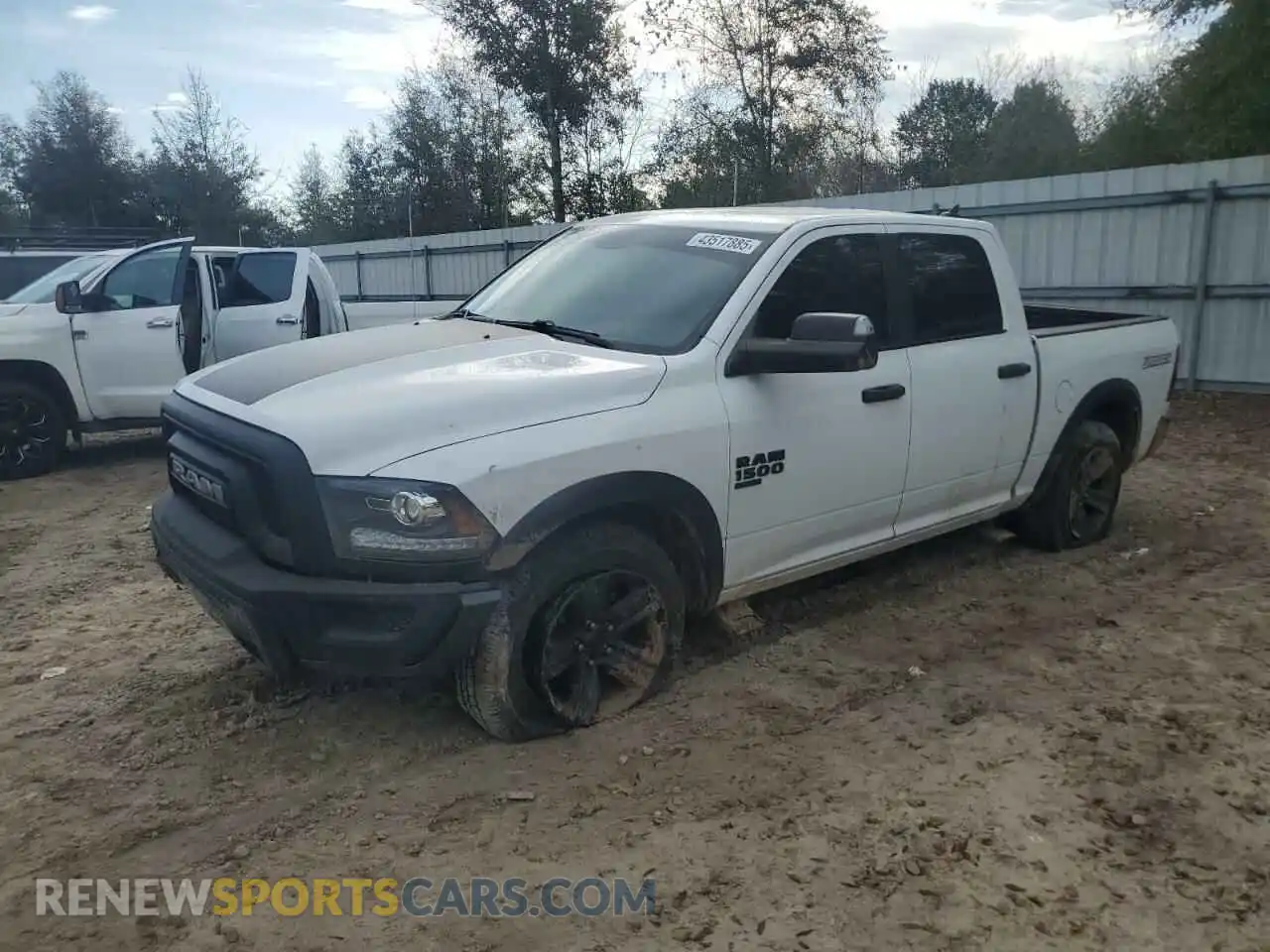 1 Photograph of a damaged car 1C6RR6LG3MS502981 RAM 1500 2021