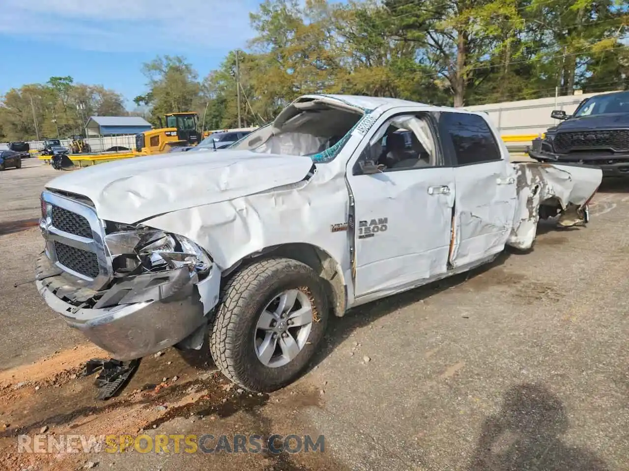 1 Photograph of a damaged car 1C6RR6TT0MS517516 RAM 1500 2021