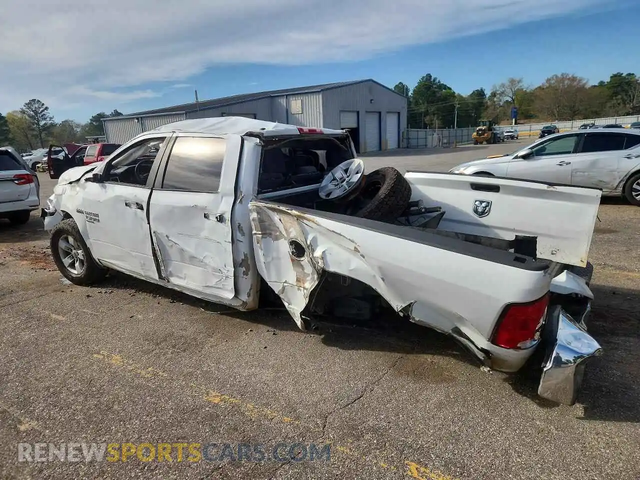 2 Photograph of a damaged car 1C6RR6TT0MS517516 RAM 1500 2021