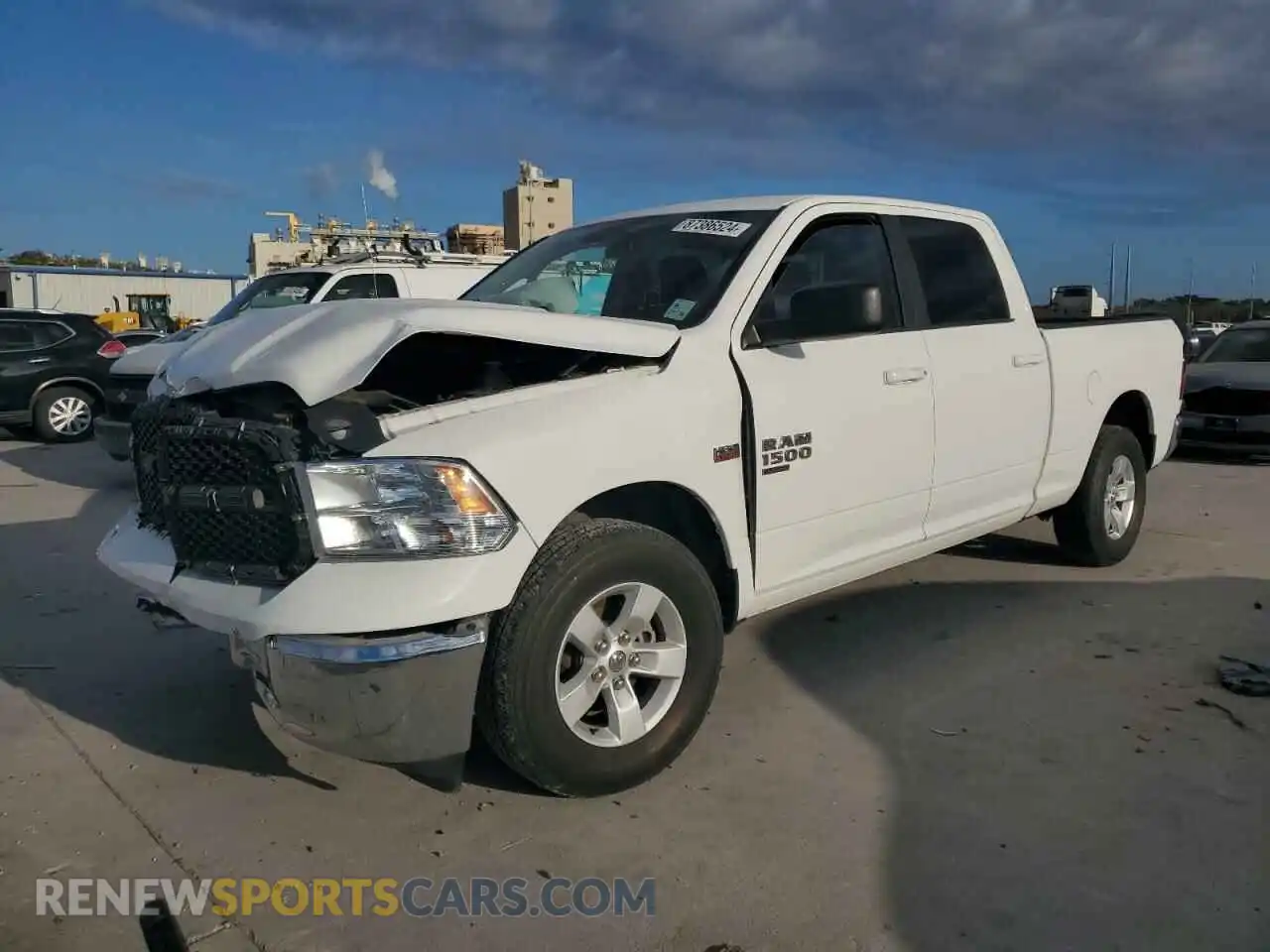 1 Photograph of a damaged car 1C6RR6TT5MS516202 RAM 1500 2021