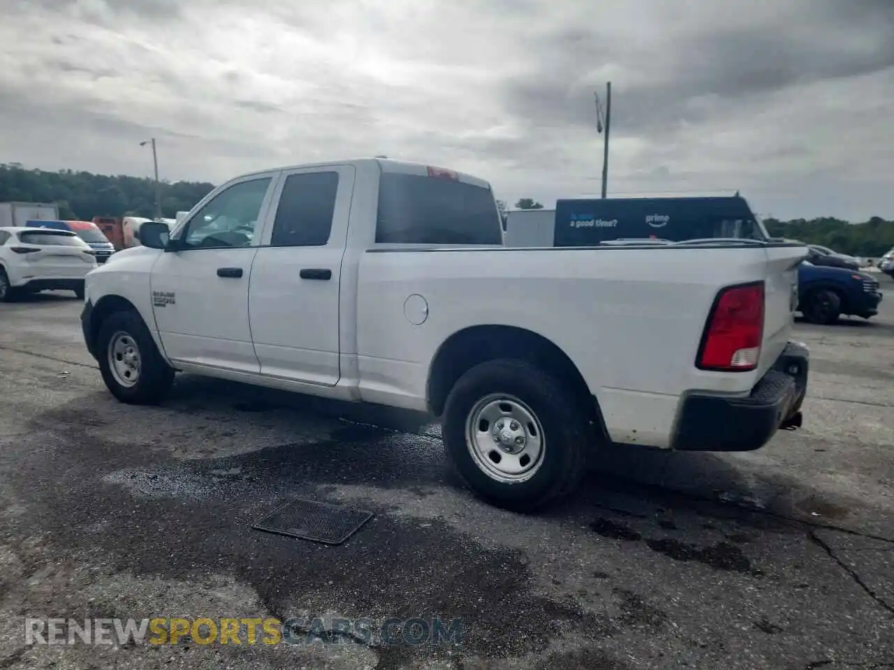 2 Photograph of a damaged car 1C6RR7FG2MS555446 RAM 1500 2021