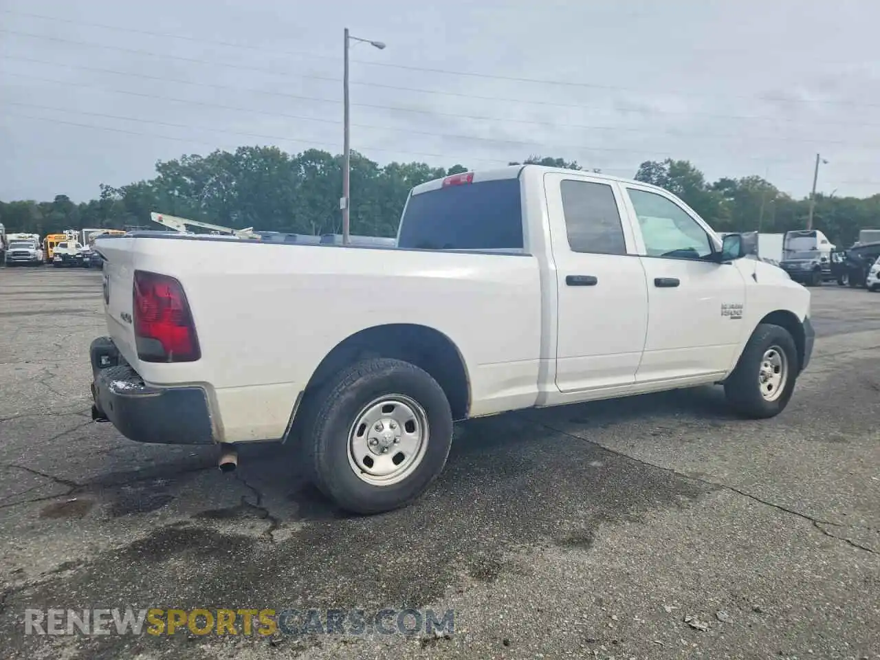 3 Photograph of a damaged car 1C6RR7FG2MS555446 RAM 1500 2021