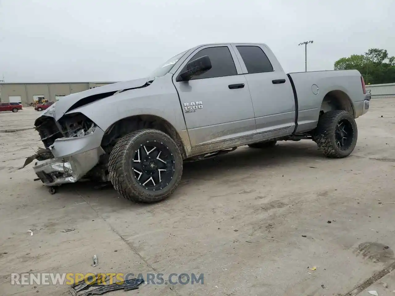 1 Photograph of a damaged car 1C6RR7FG5MS584780 RAM 1500 2021