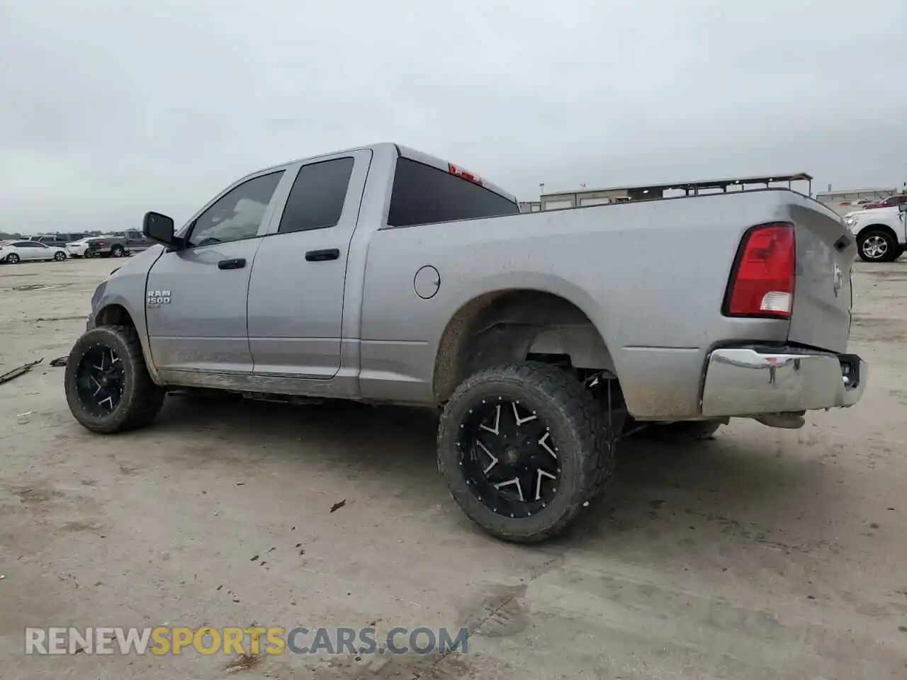 2 Photograph of a damaged car 1C6RR7FG5MS584780 RAM 1500 2021