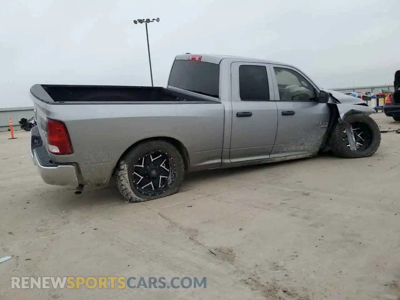 3 Photograph of a damaged car 1C6RR7FG5MS584780 RAM 1500 2021