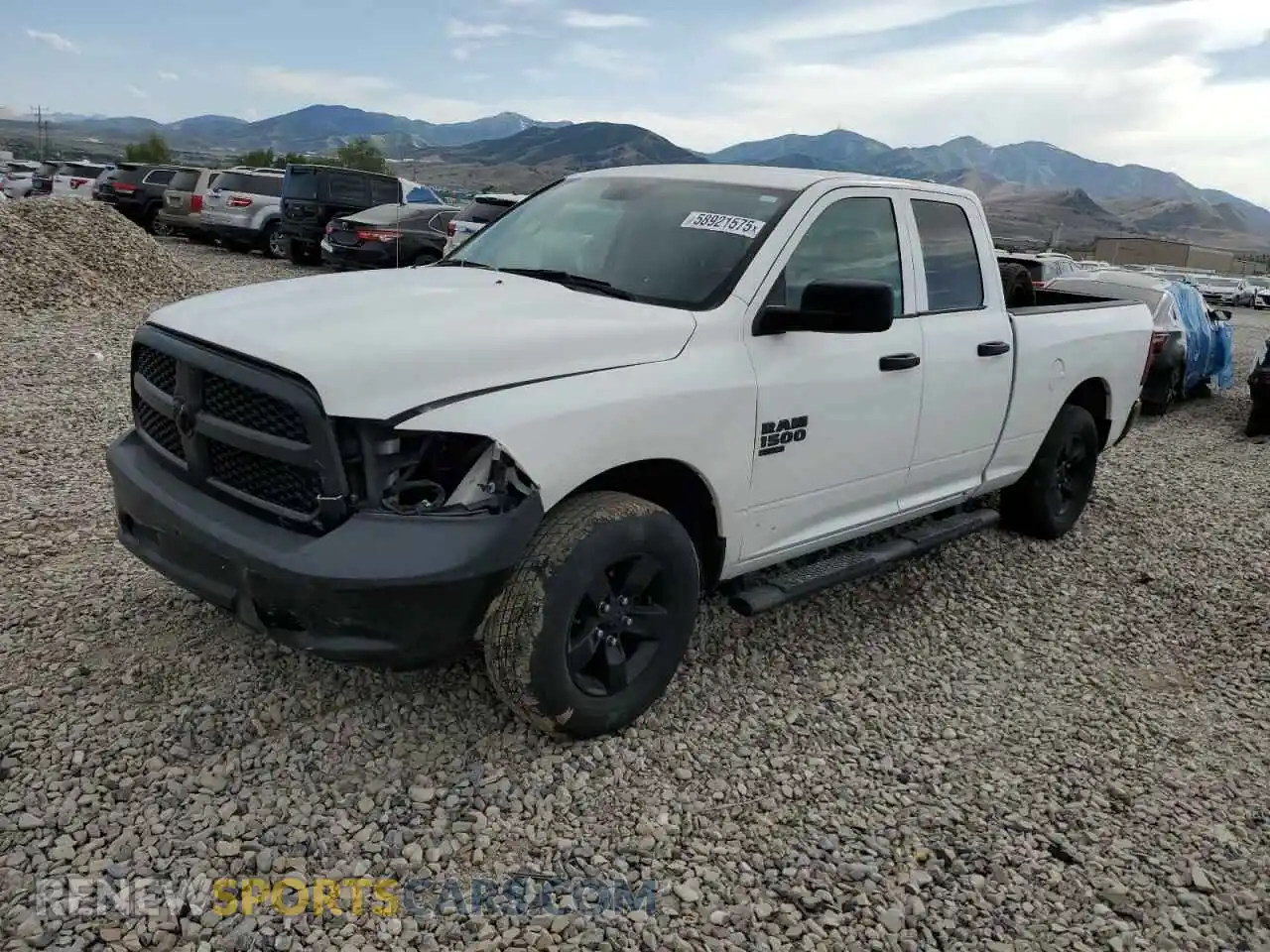 1 Photograph of a damaged car 1C6RR7FG8MS583350 RAM 1500 2021