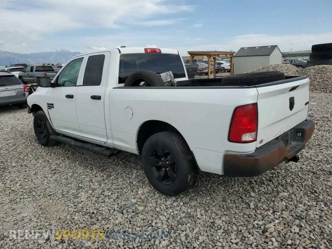 2 Photograph of a damaged car 1C6RR7FG8MS583350 RAM 1500 2021