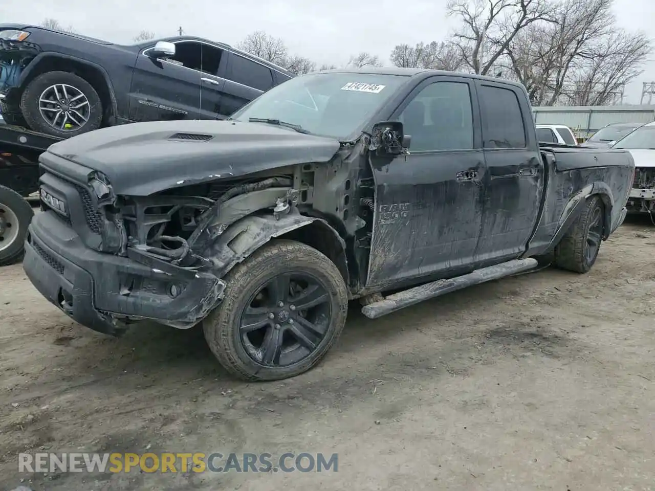 1 Photograph of a damaged car 1C6RR7GGXMS531233 RAM 1500 2021
