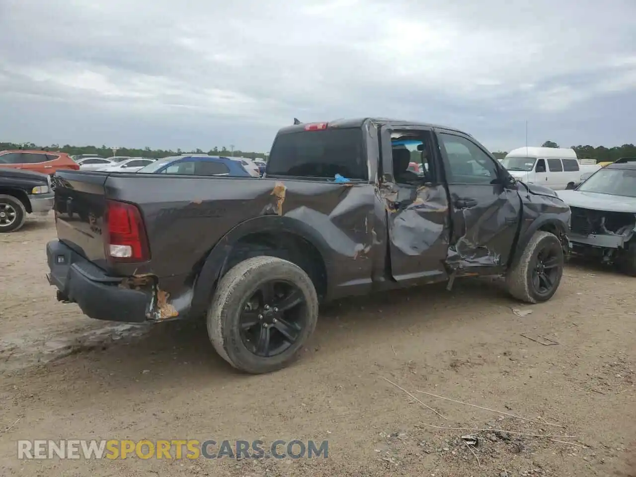 3 Photograph of a damaged car 1C6RR7GT0MS514972 RAM 1500 2021