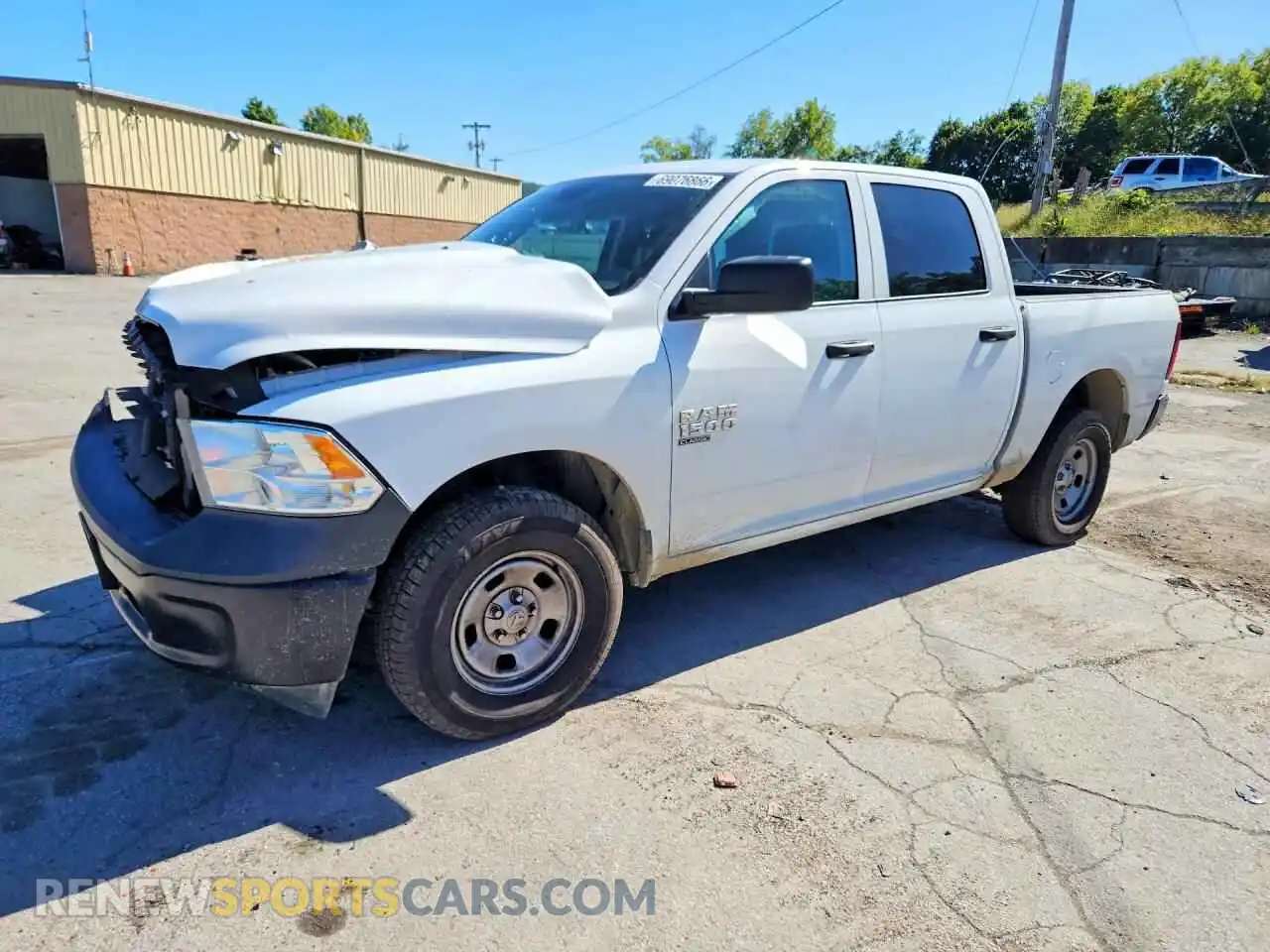 1 Photograph of a damaged car 1C6RR7KG8MS562648 RAM 1500 2021