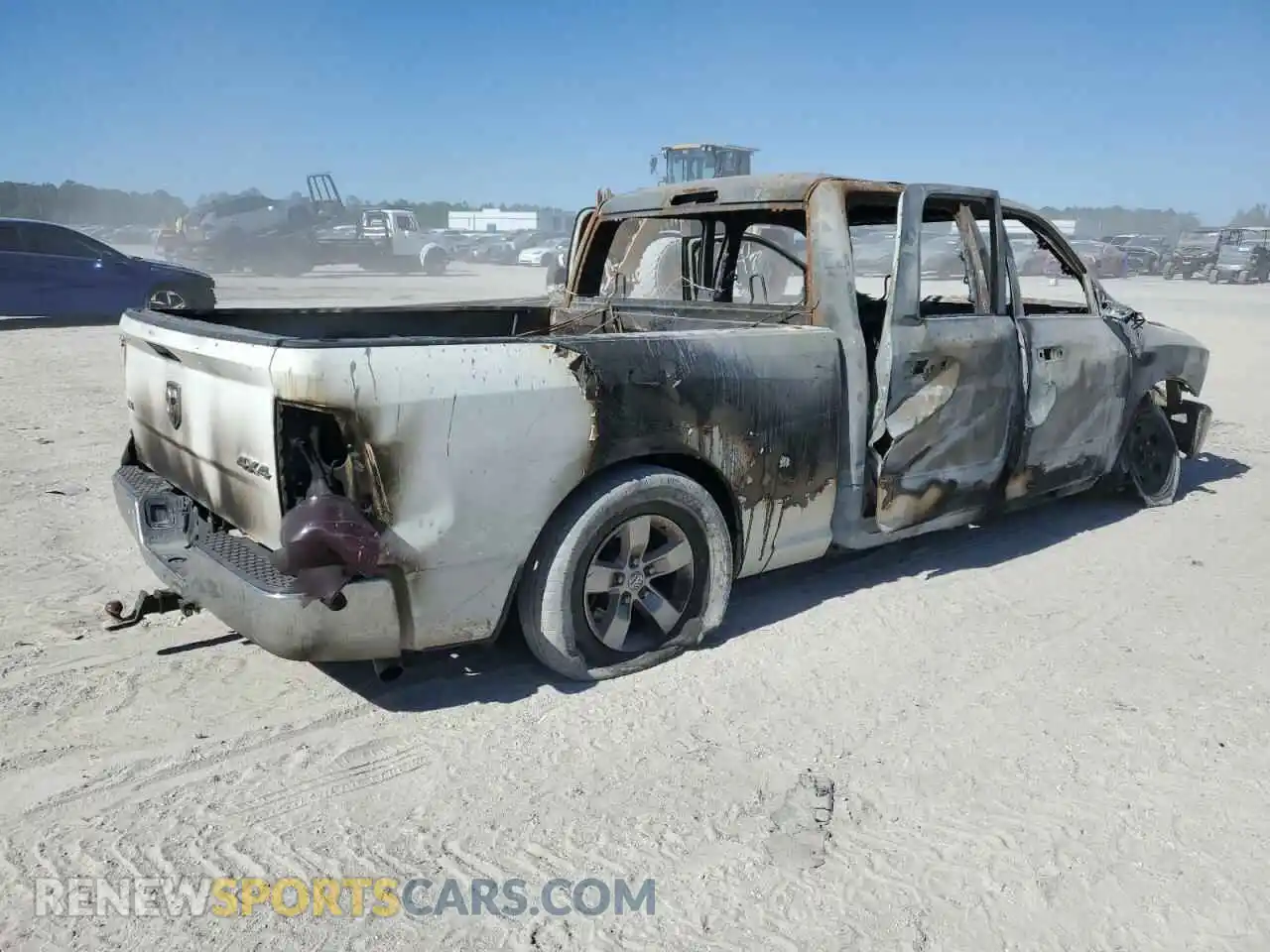 3 Photograph of a damaged car 1C6RR7TT9MS518296 RAM 1500 2021