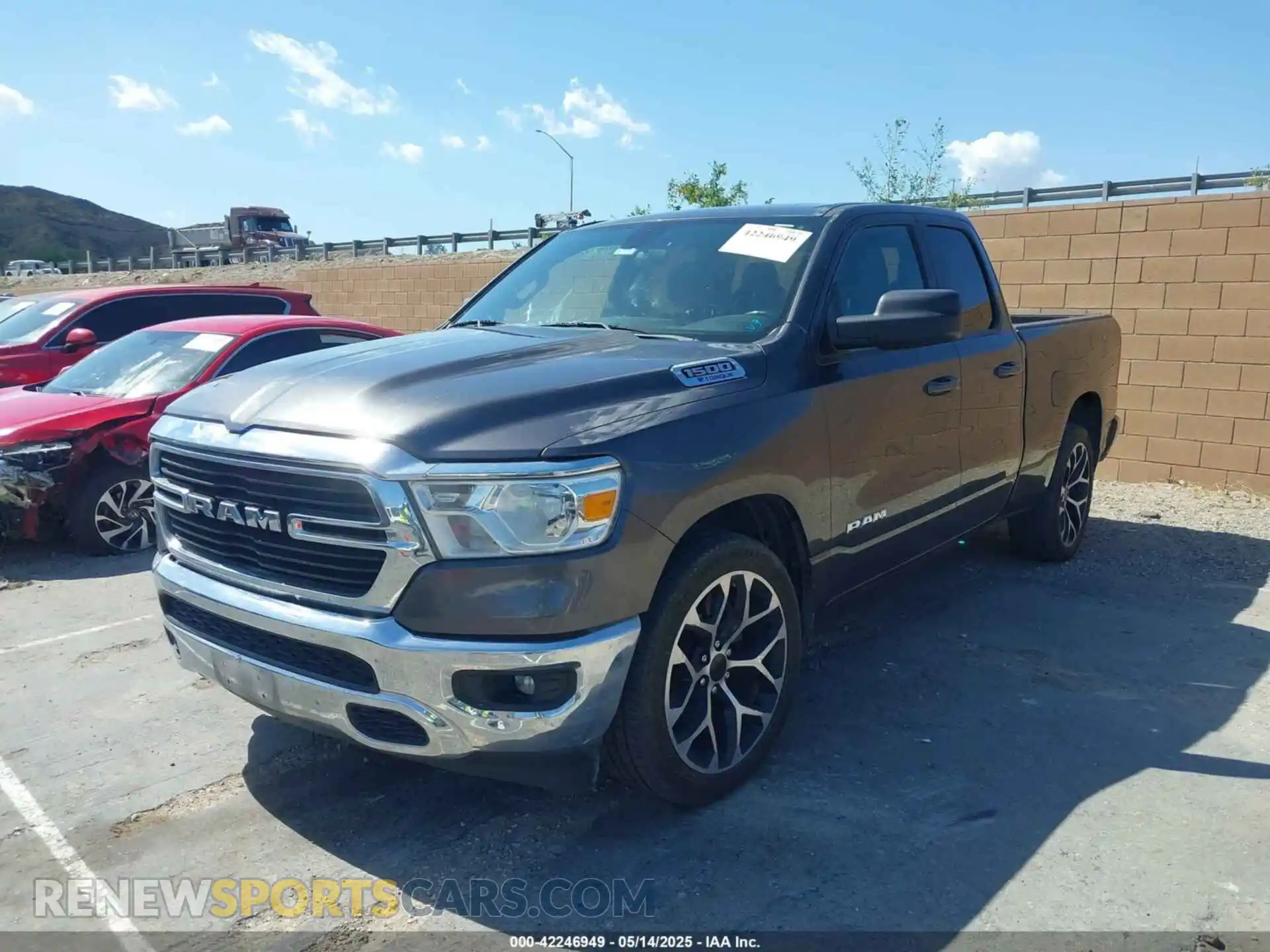 2 Photograph of a damaged car 1C6RREBG3MN743725 RAM 1500 2021