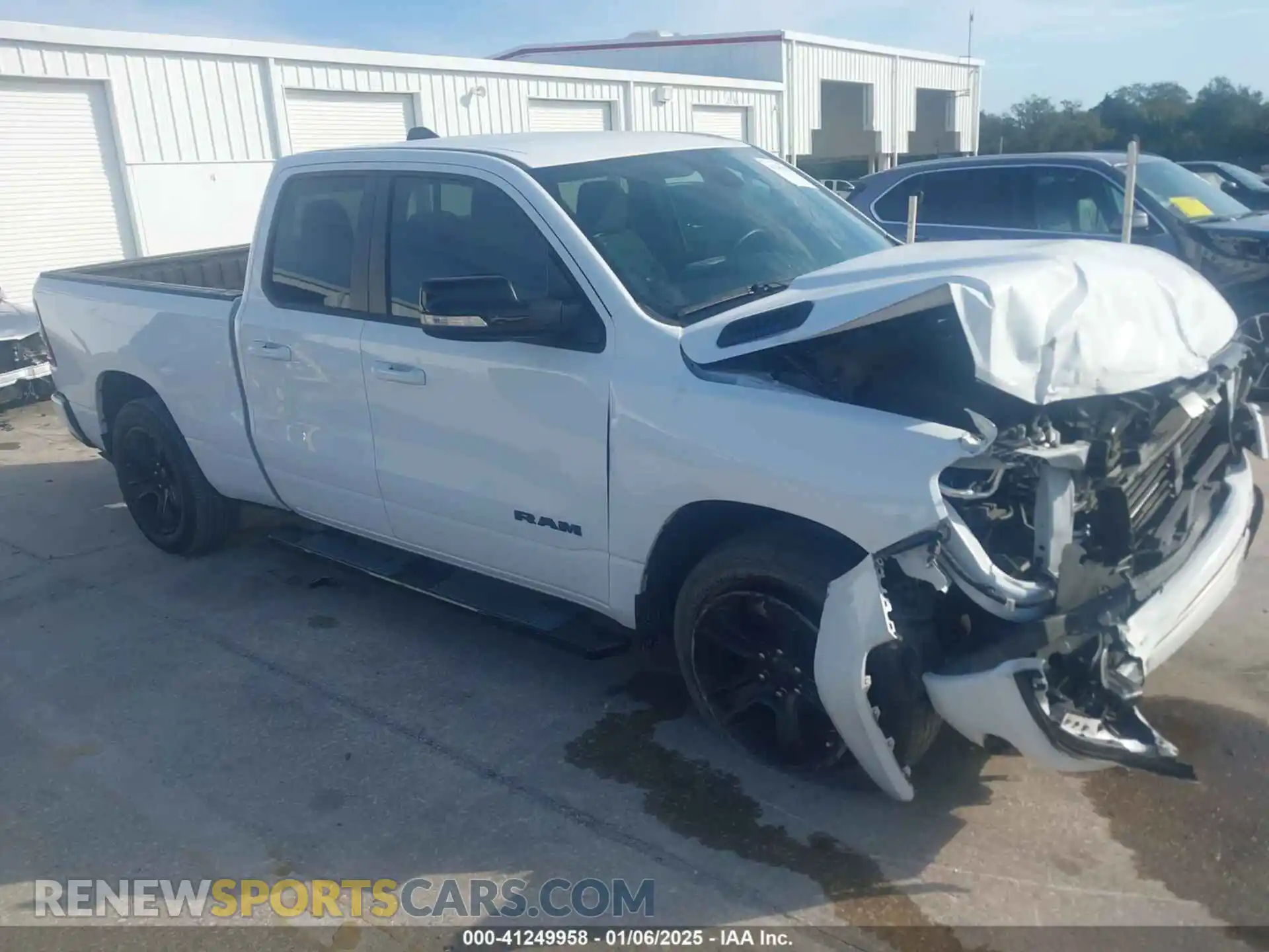 1 Photograph of a damaged car 1C6RREBG3MN753106 RAM 1500 2021