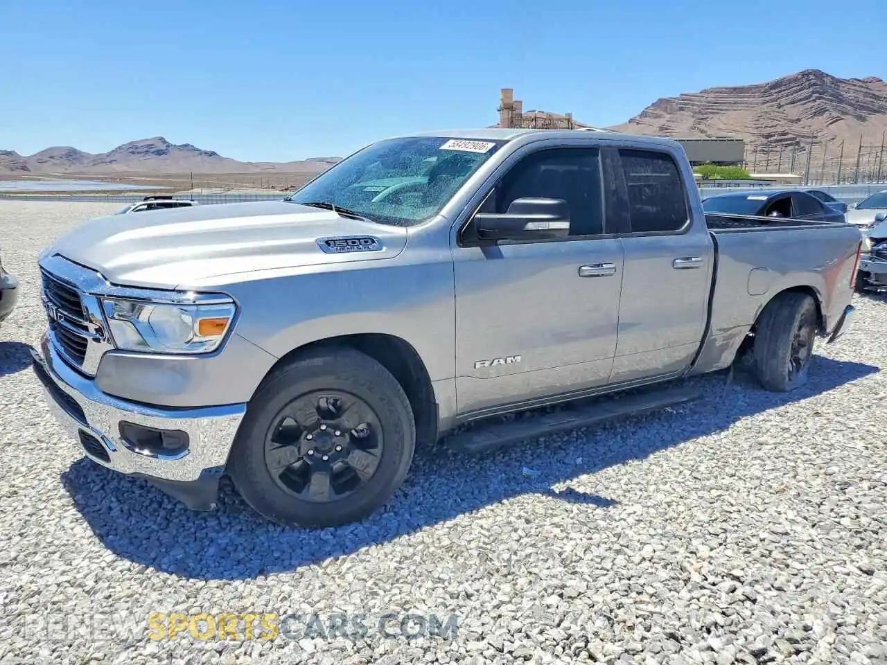 1 Photograph of a damaged car 1C6RREBT0MN545228 RAM 1500 2021