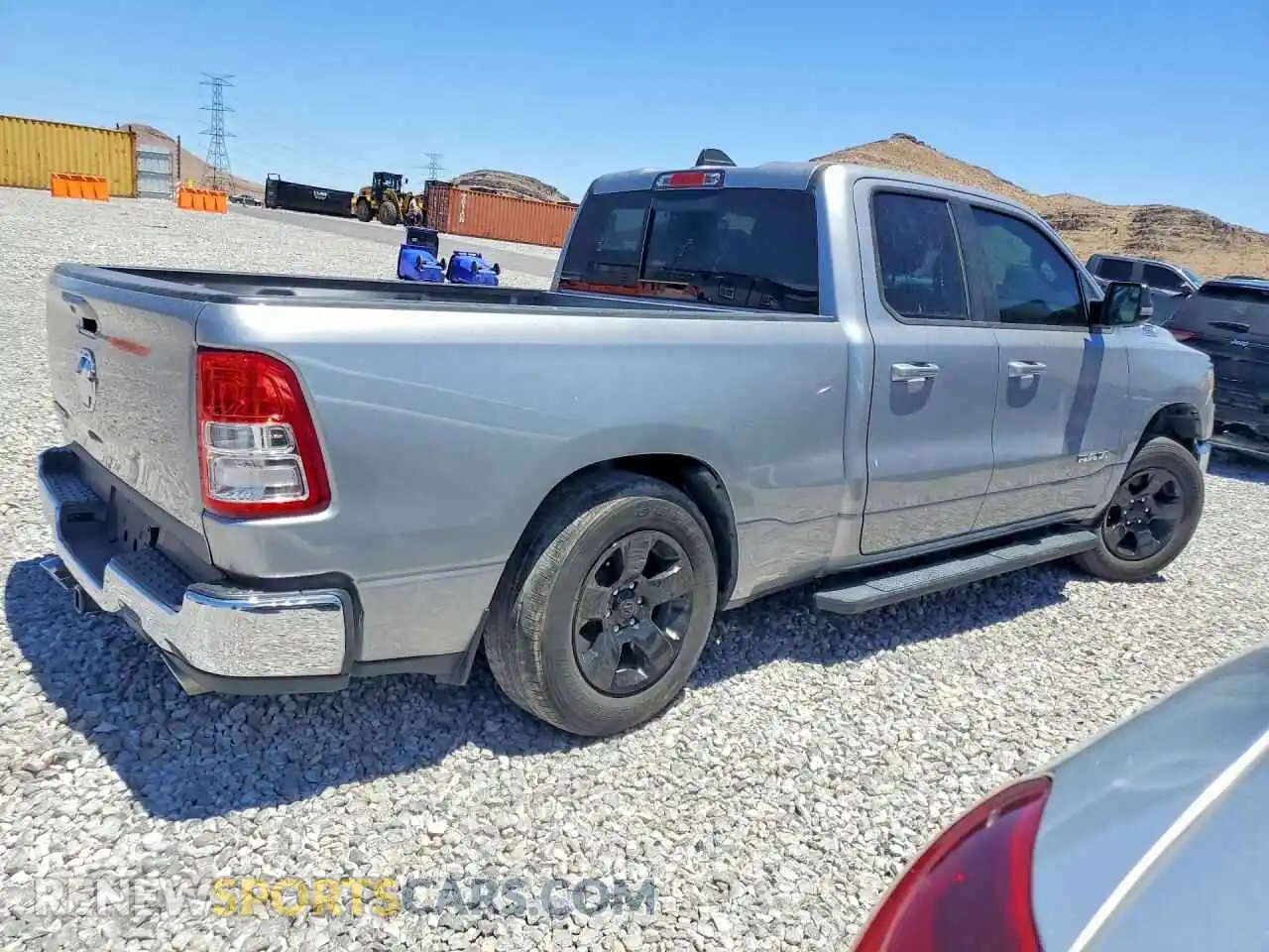 3 Photograph of a damaged car 1C6RREBT0MN545228 RAM 1500 2021