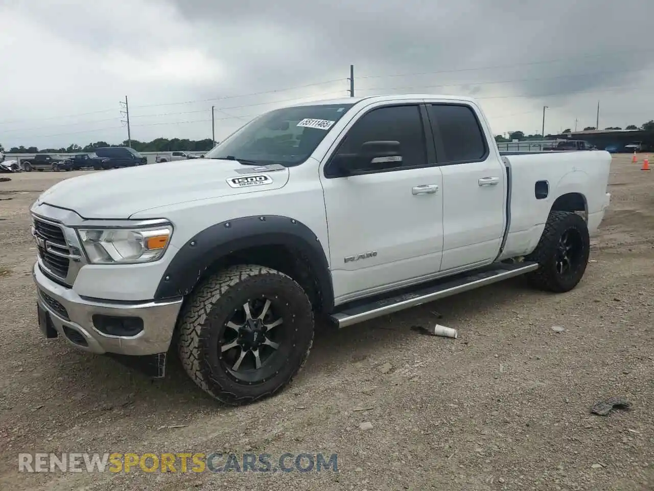 1 Photograph of a damaged car 1C6RREBT0MN710503 RAM 1500 2021