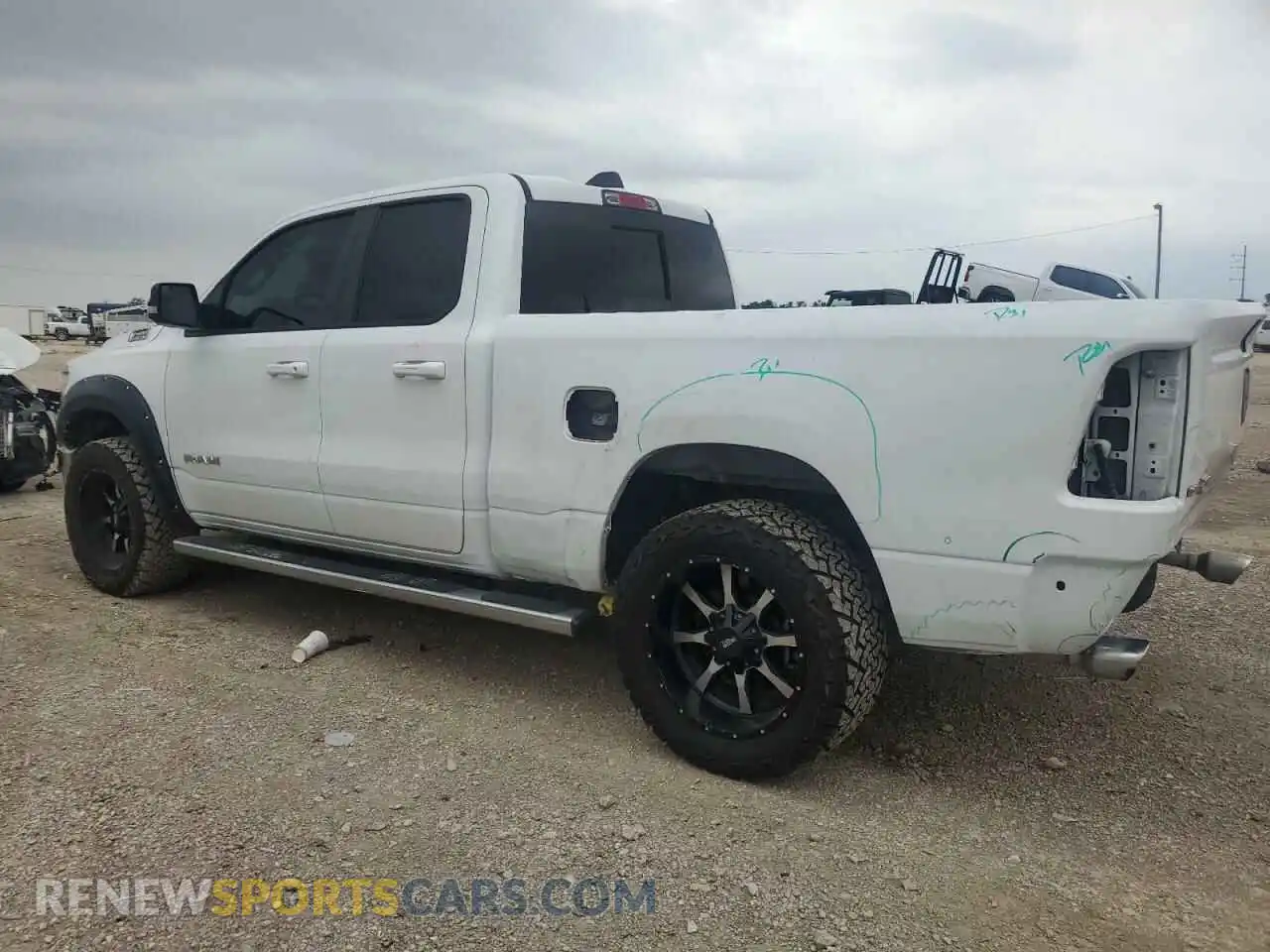 2 Photograph of a damaged car 1C6RREBT0MN710503 RAM 1500 2021