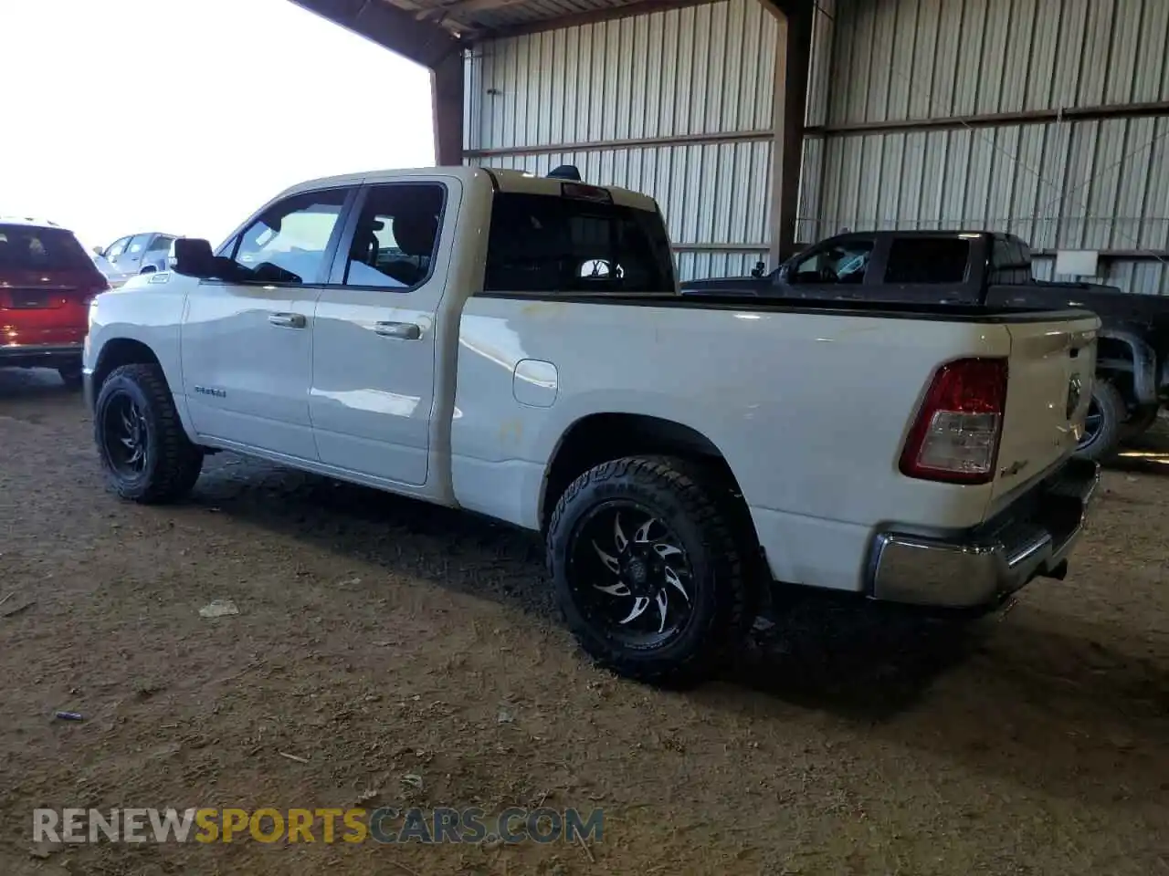 2 Photograph of a damaged car 1C6RREBT1MN801599 RAM 1500 2021