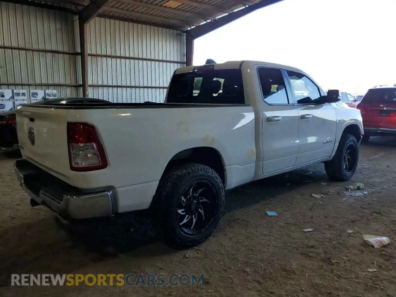 3 Photograph of a damaged car 1C6RREBT1MN801599 RAM 1500 2021
