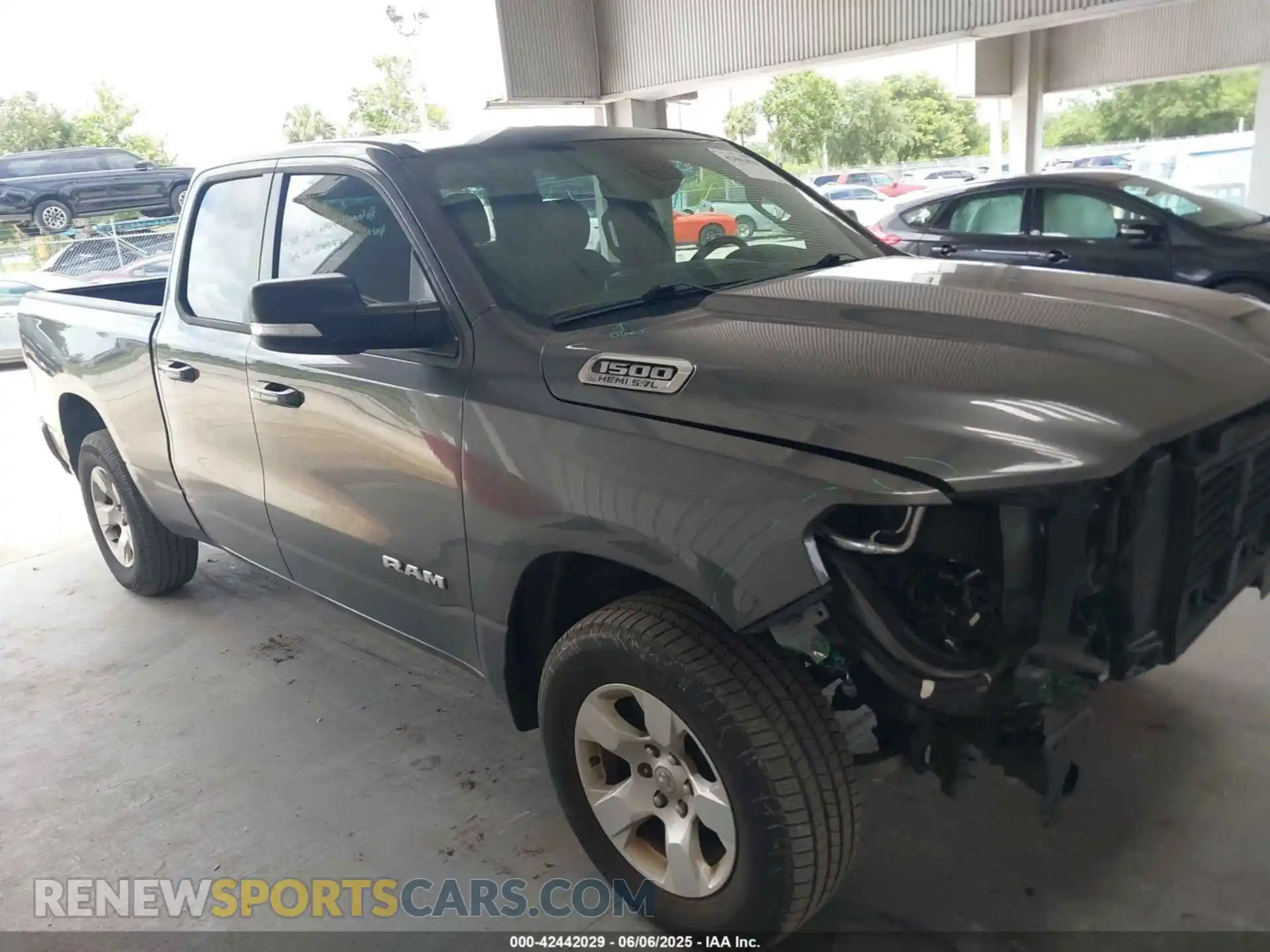 1 Photograph of a damaged car 1C6RREBT2MN747391 RAM 1500 2021