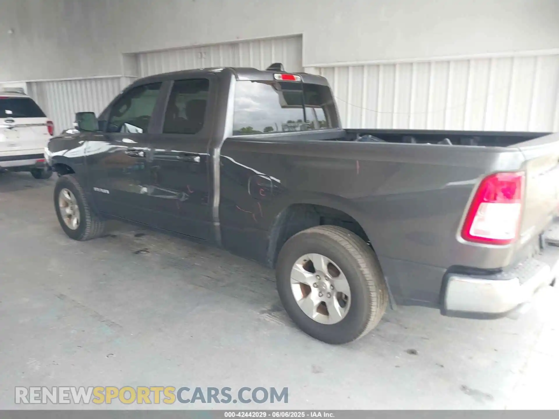 3 Photograph of a damaged car 1C6RREBT2MN747391 RAM 1500 2021