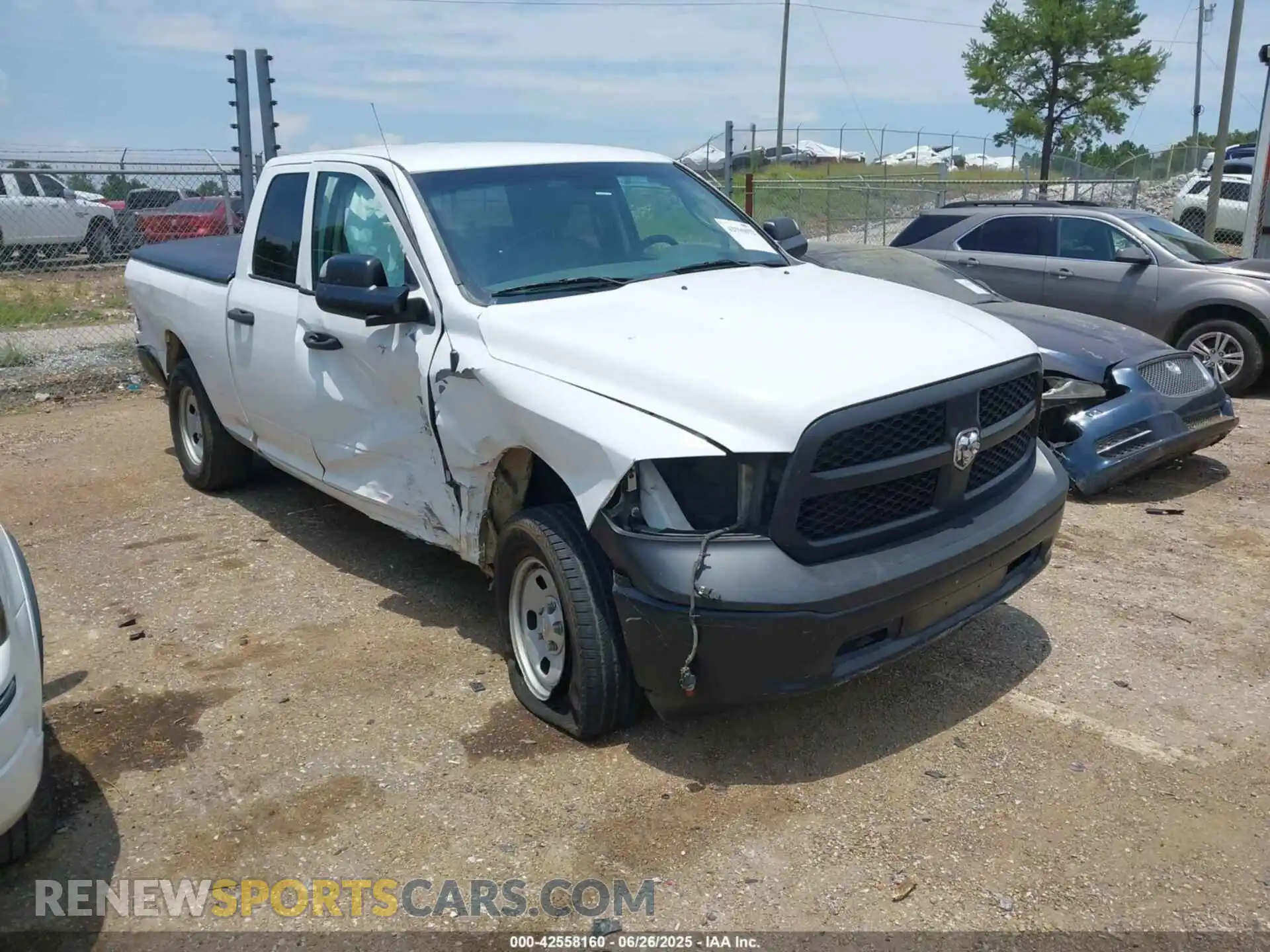 1 Photograph of a damaged car 1C6RREBT2MN821280 RAM 1500 2021