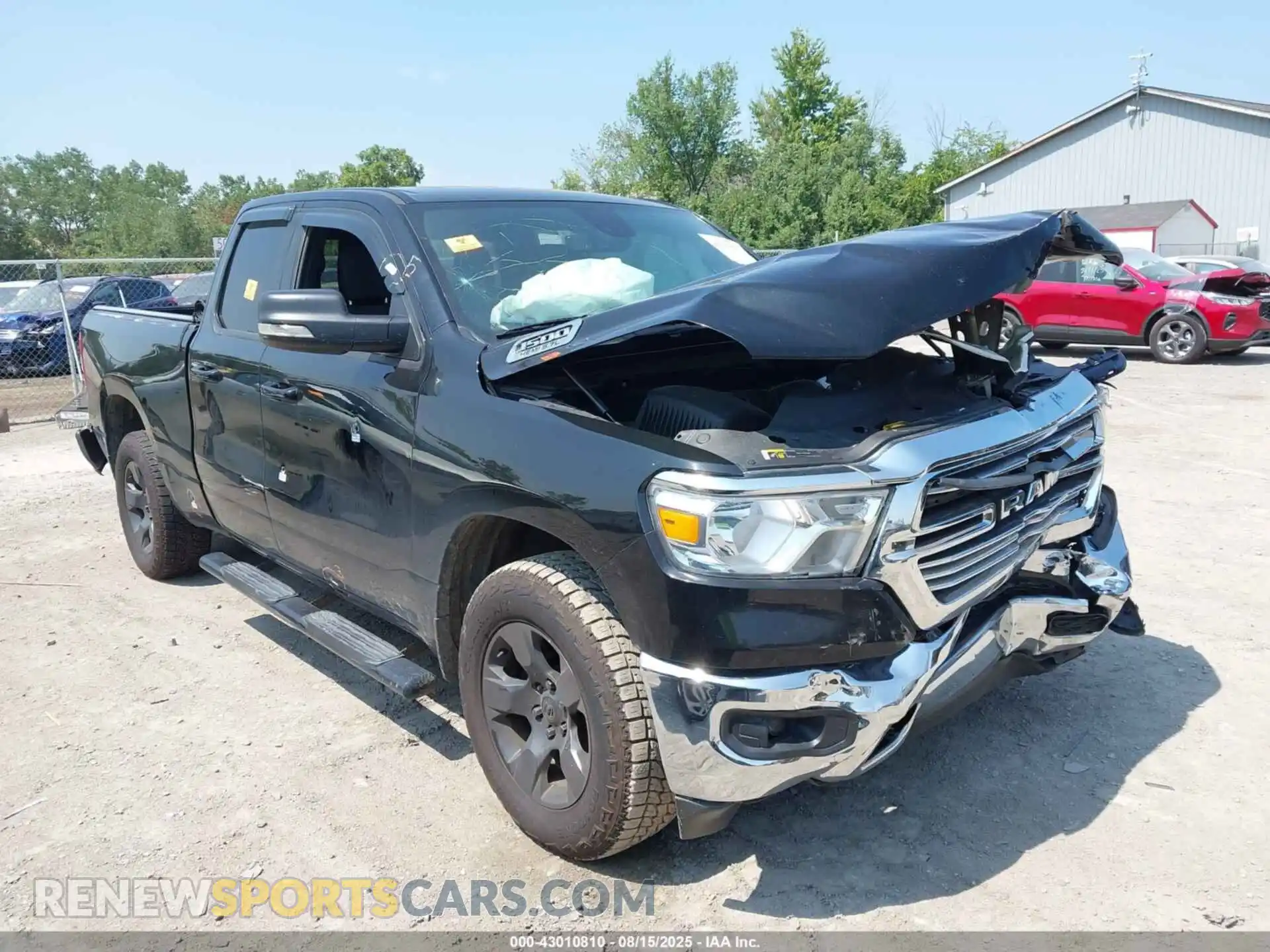 1 Photograph of a damaged car 1C6RREBT3MN708986 RAM 1500 2021