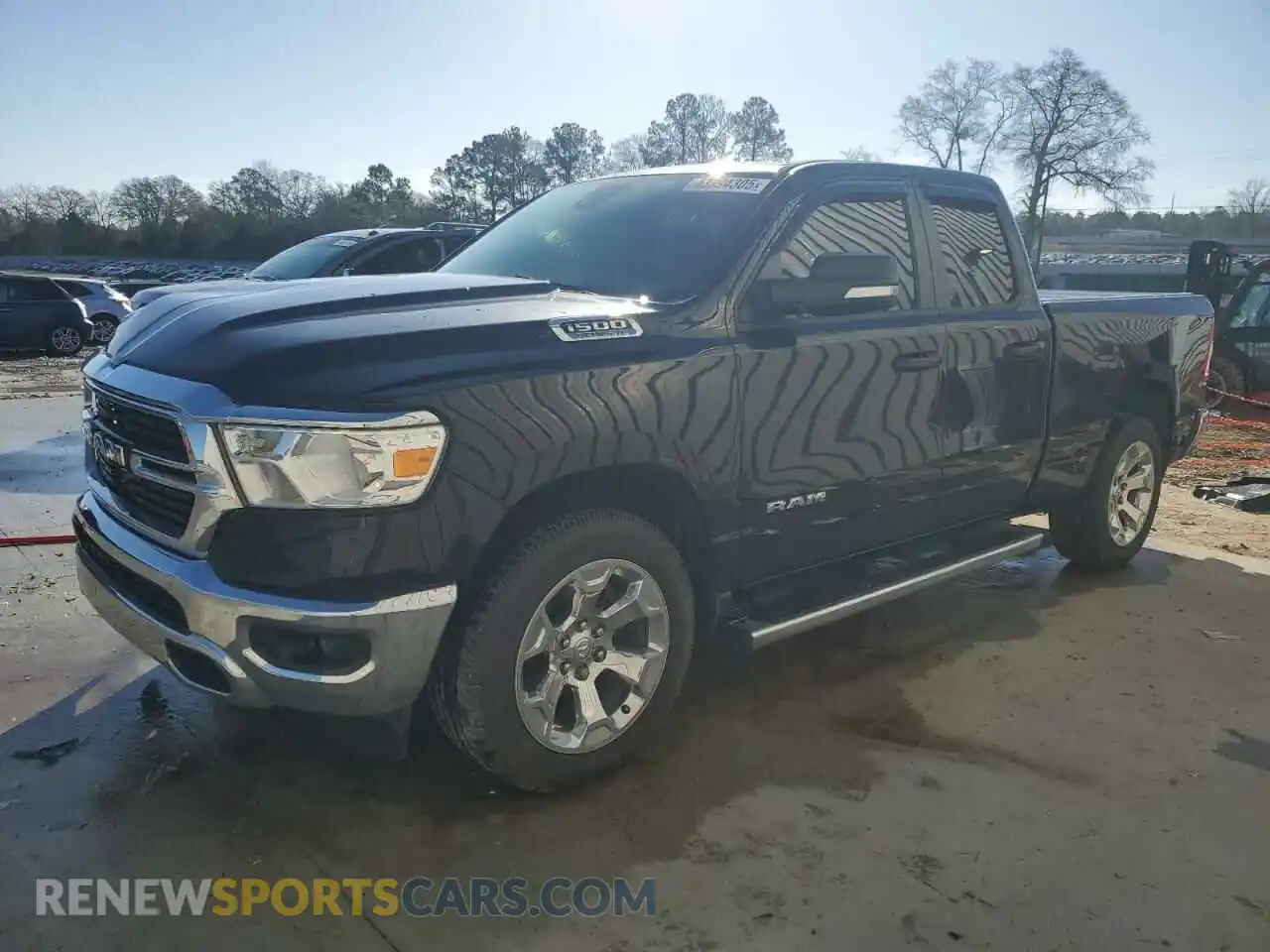 1 Photograph of a damaged car 1C6RREBT5MN819782 RAM 1500 2021