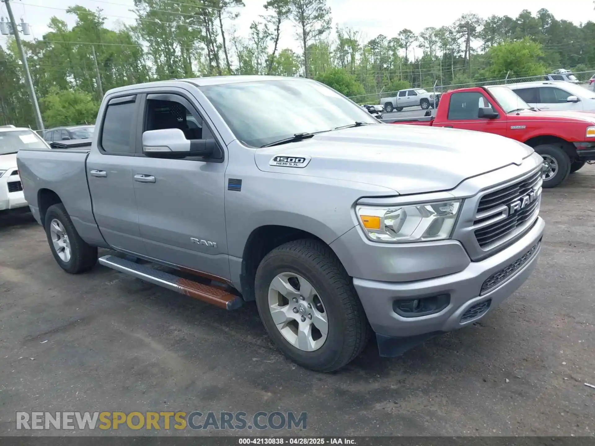 1 Photograph of a damaged car 1C6RREBT7MN801896 RAM 1500 2021
