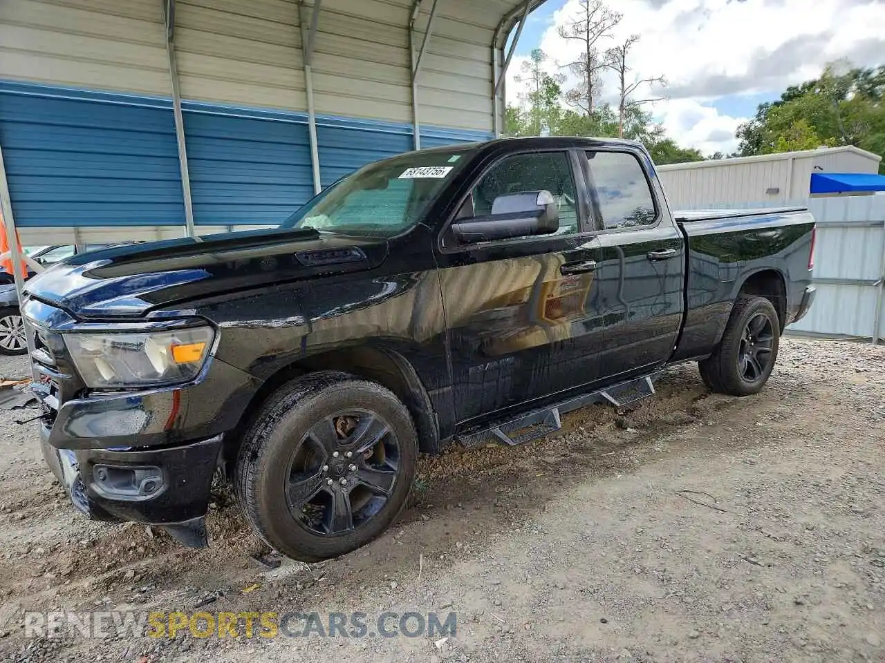 1 Photograph of a damaged car 1C6RREBT7MN821663 RAM 1500 2021