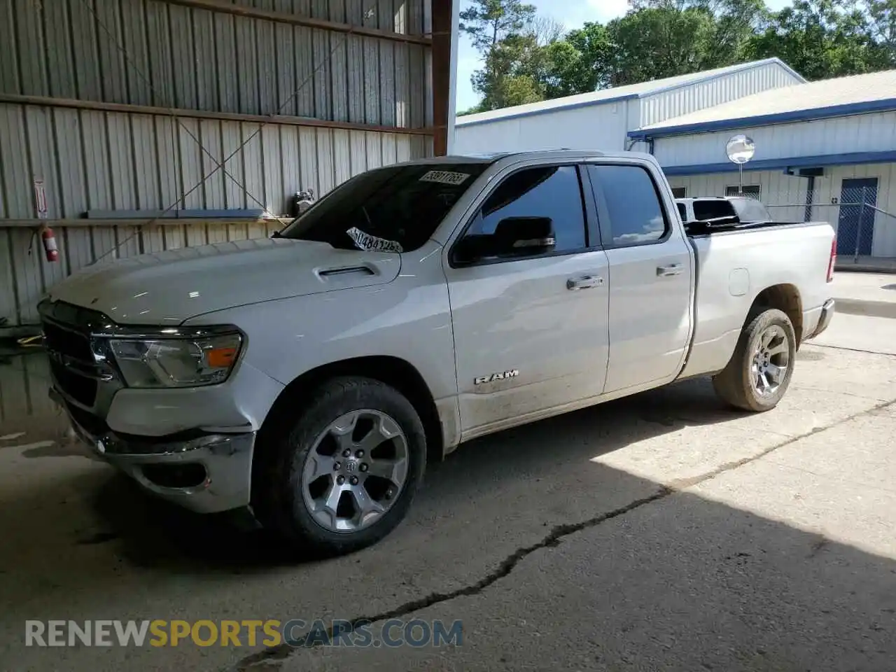 1 Photograph of a damaged car 1C6RREBT8MN625392 RAM 1500 2021