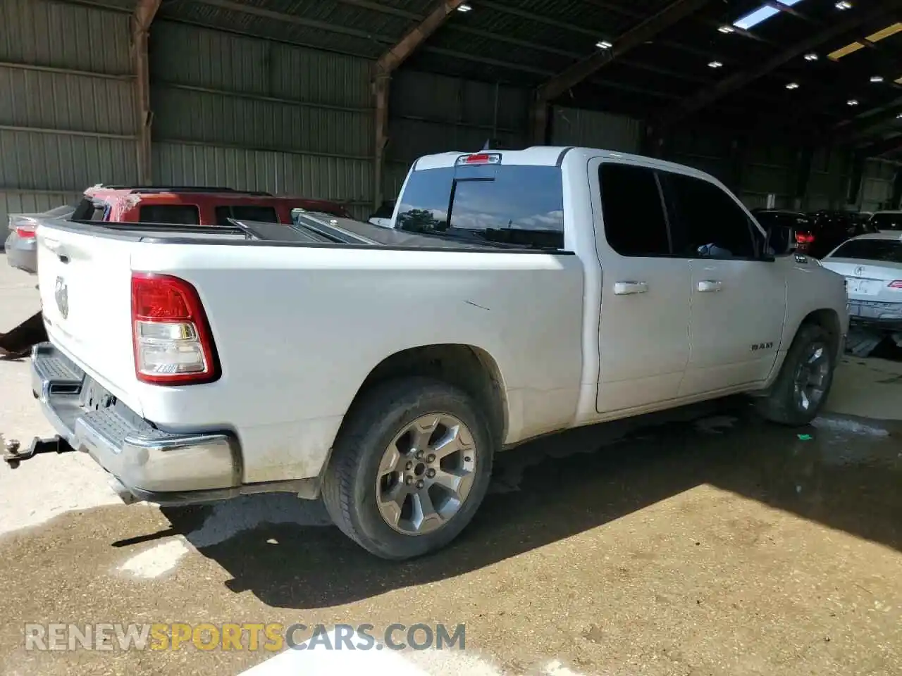 3 Photograph of a damaged car 1C6RREBT8MN625392 RAM 1500 2021